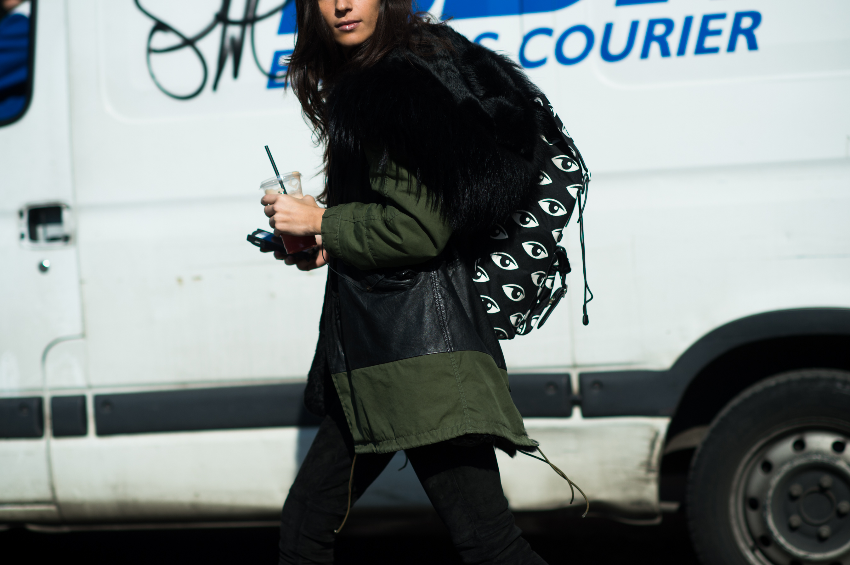 Italian woman wearing green parka