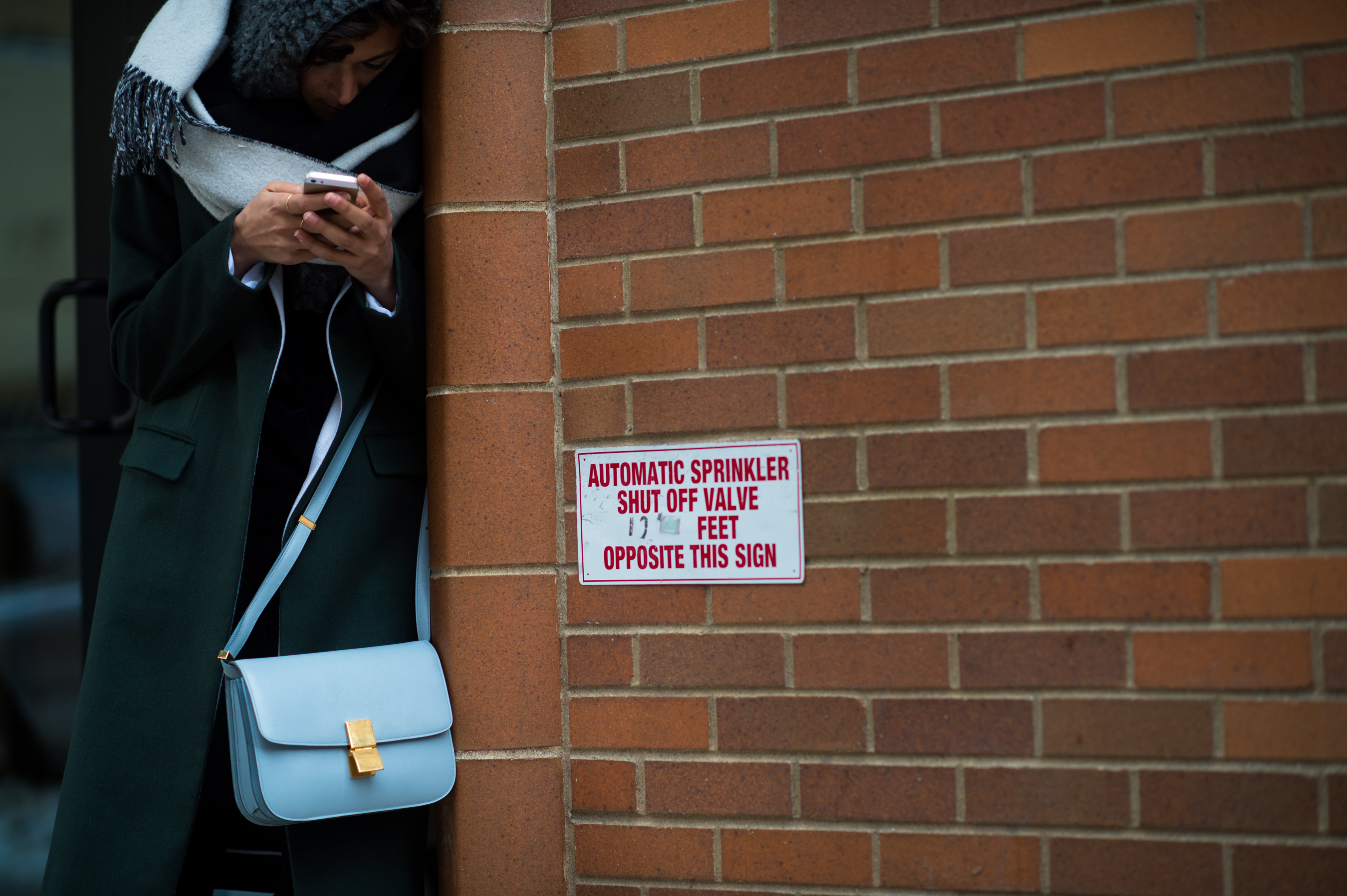 Girl wearing big scarf and Céline bag