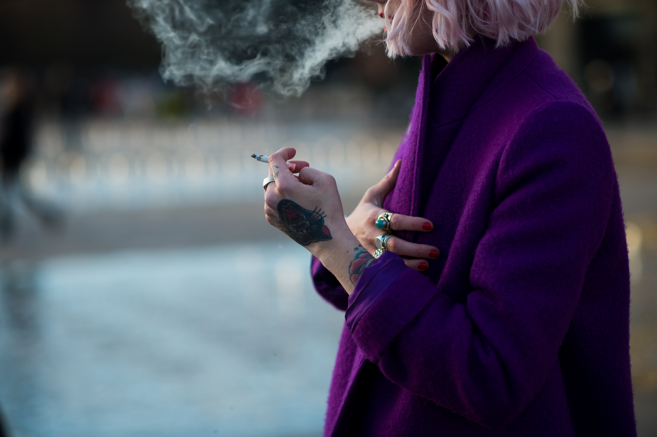 Norwegian blogger wearing purple and smoking