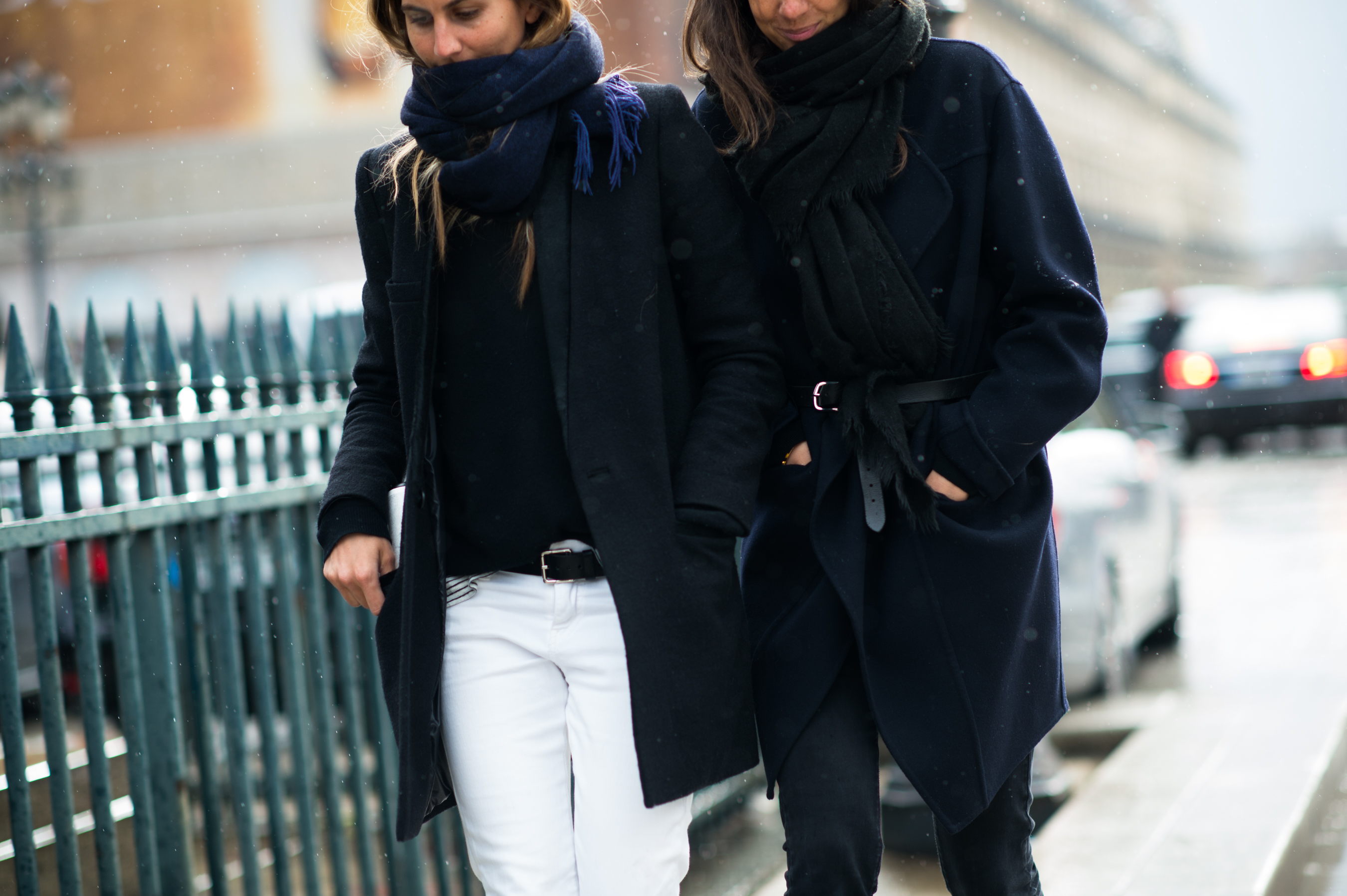 Two French women walking in the rain