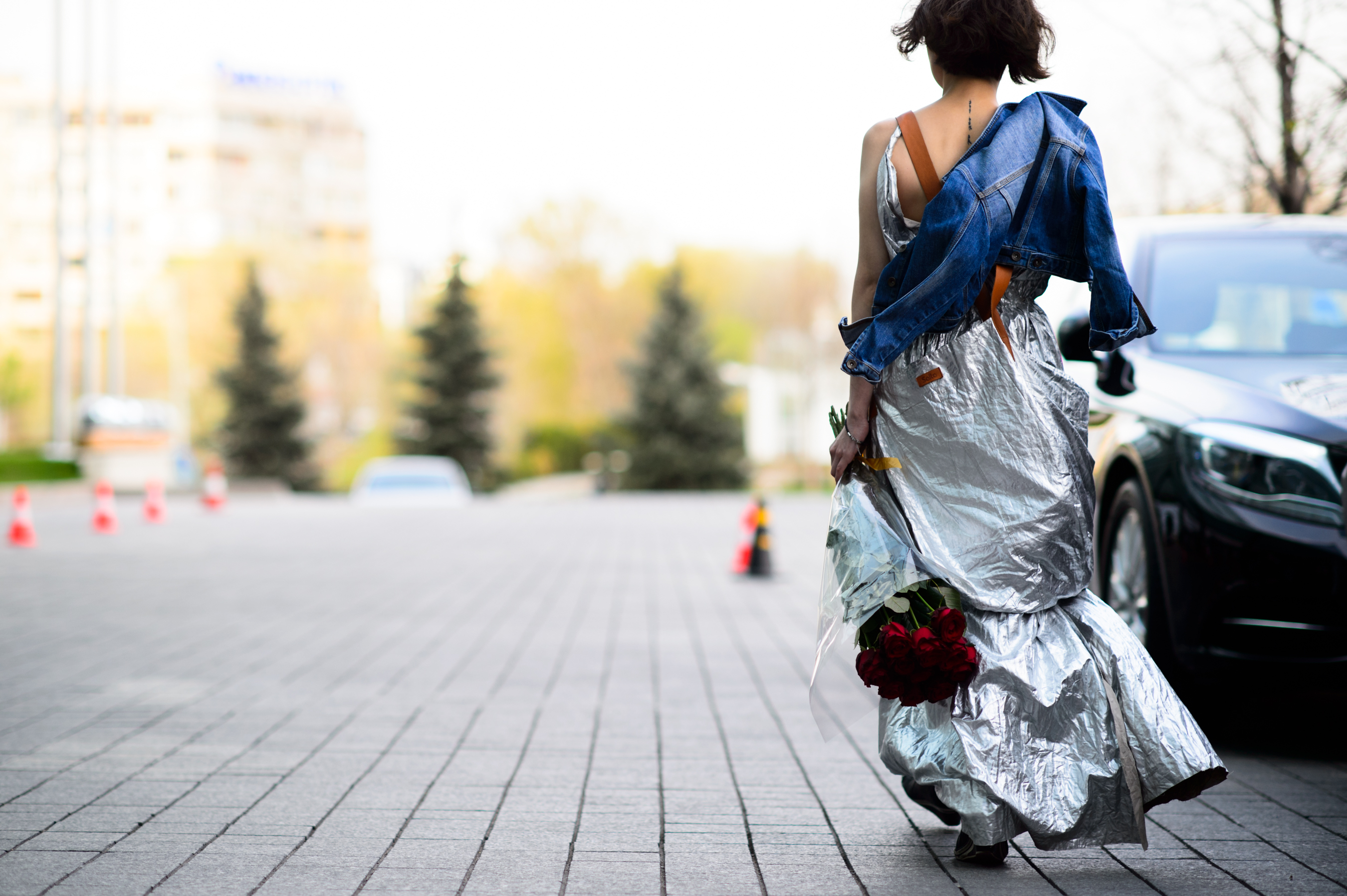 Woman wearing metallic silver dress in Kazakhstan