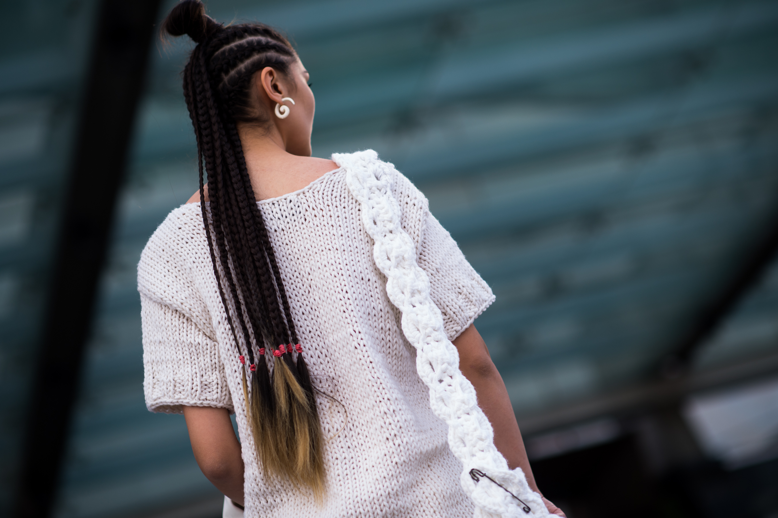 Kazakh woman with corn rows in her hair