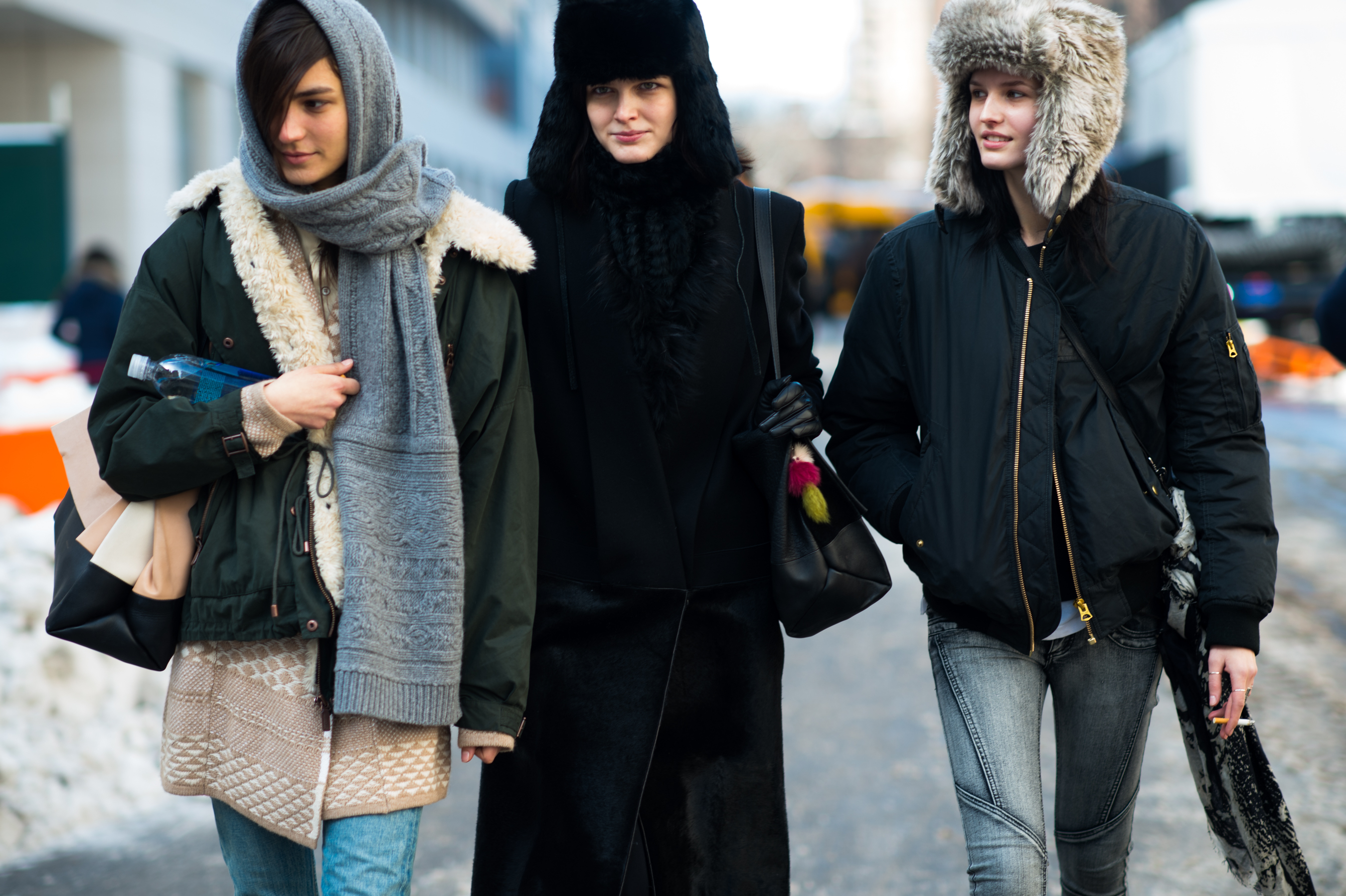 Three models walking together in NYC