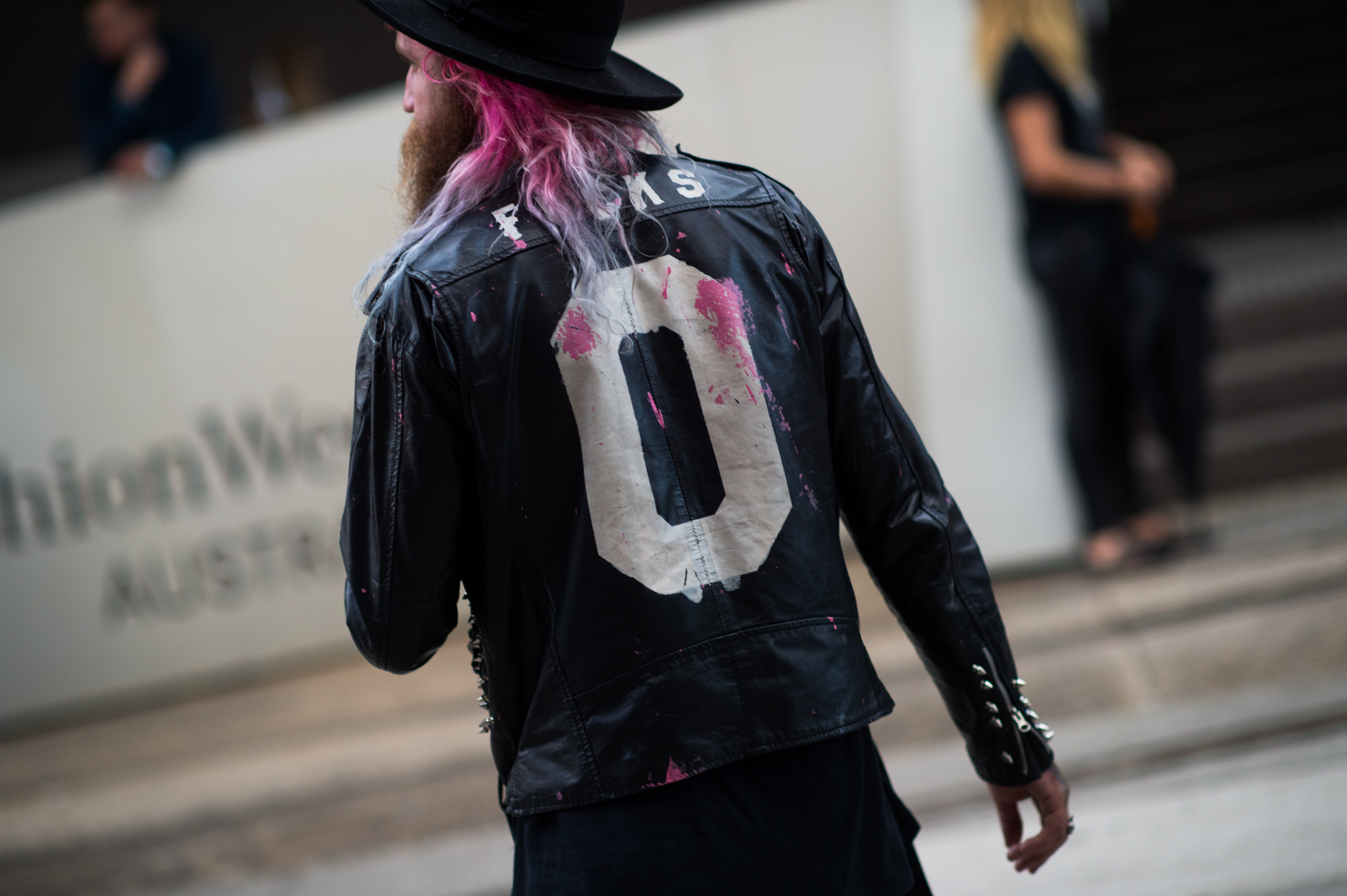 Man wearing 0 Fucks leather jacket