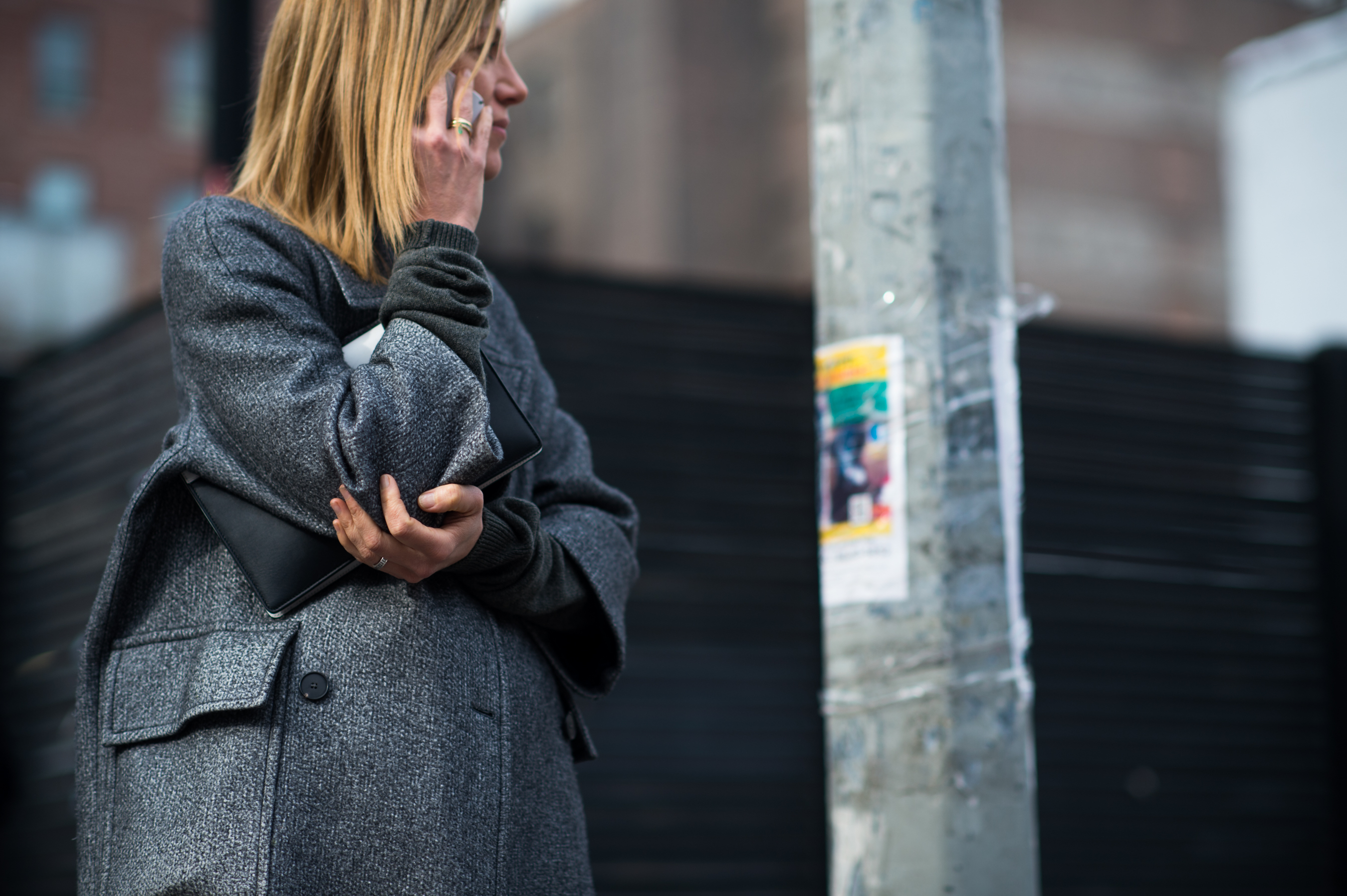 Vogue editor wearing a grey coat