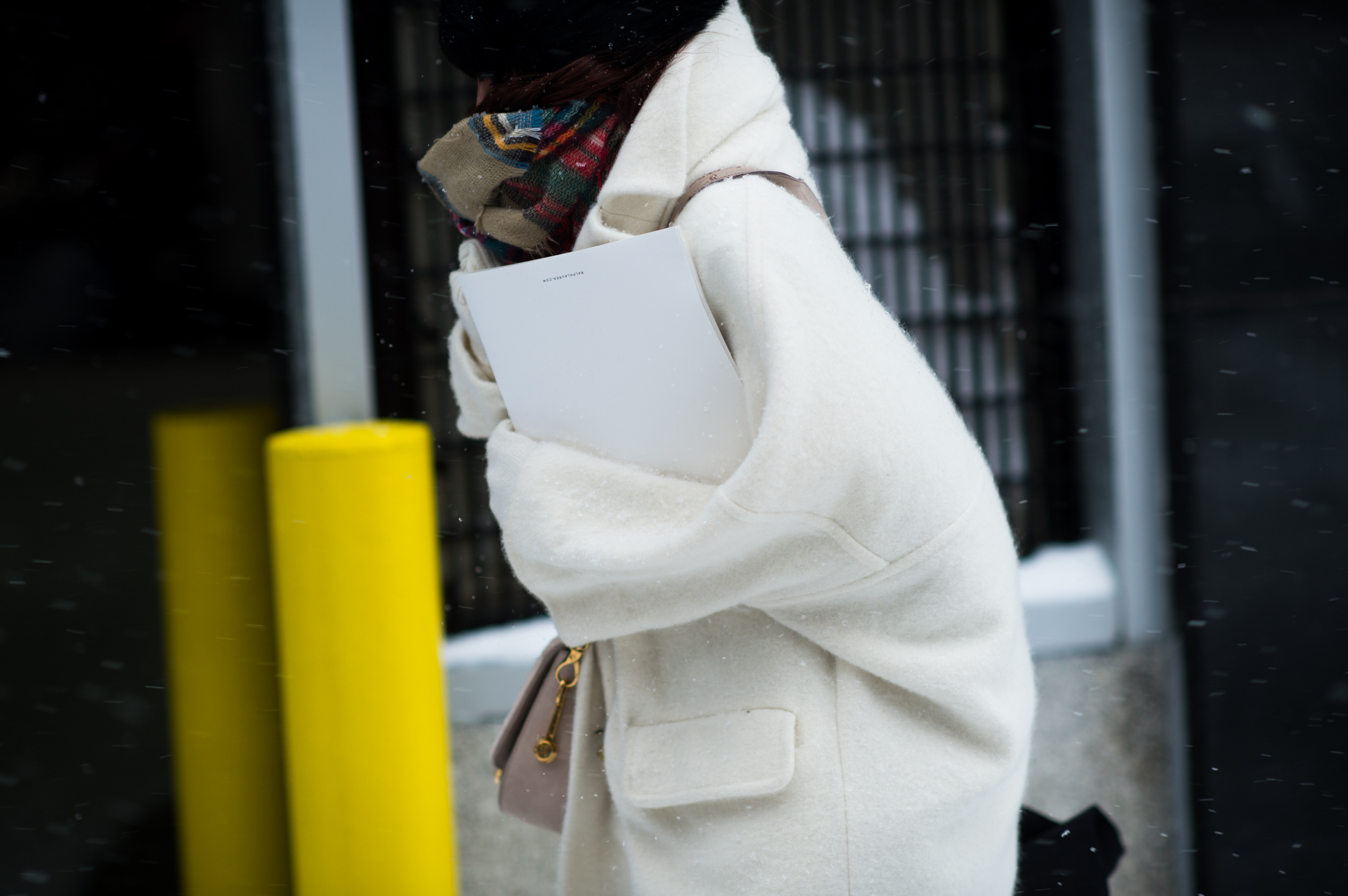 Woman wearing white winter coat