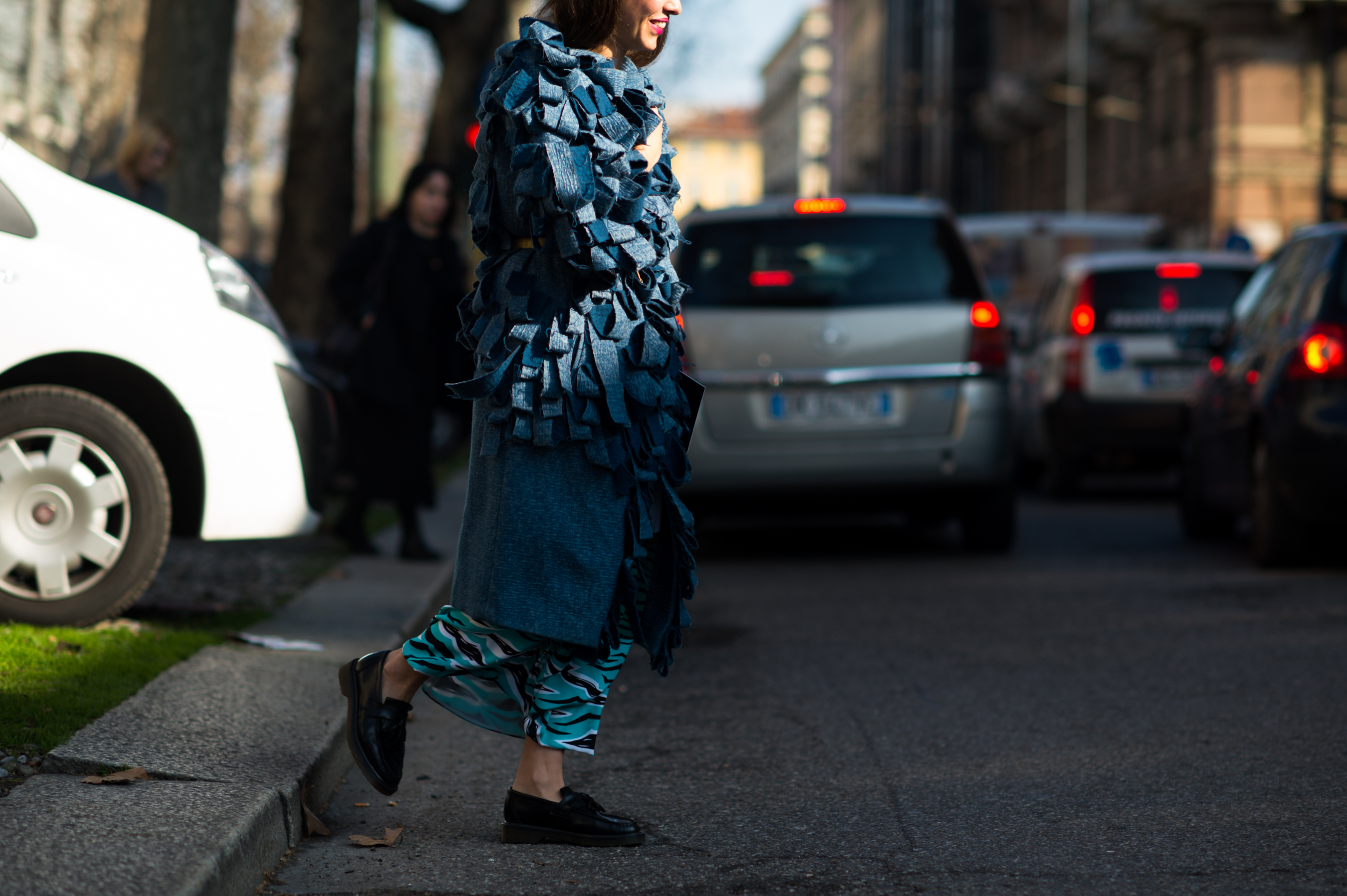 Greek woman wearing blue coat