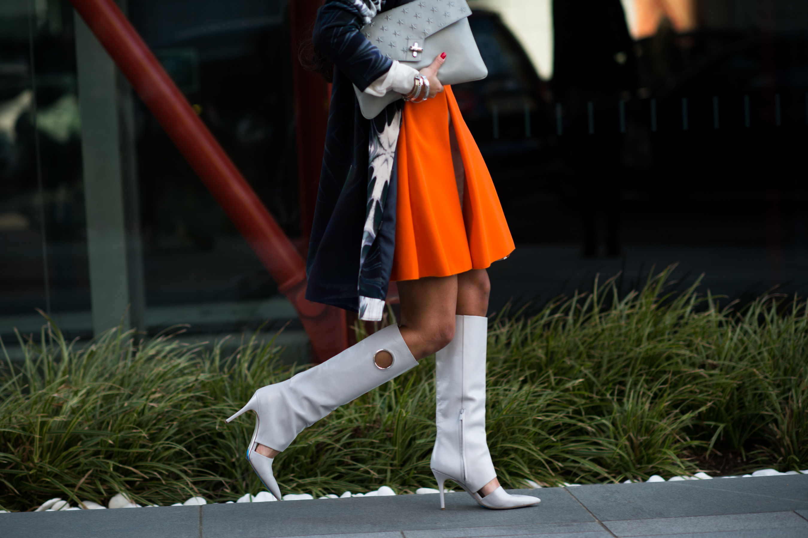 Woman wearing grey tall boots