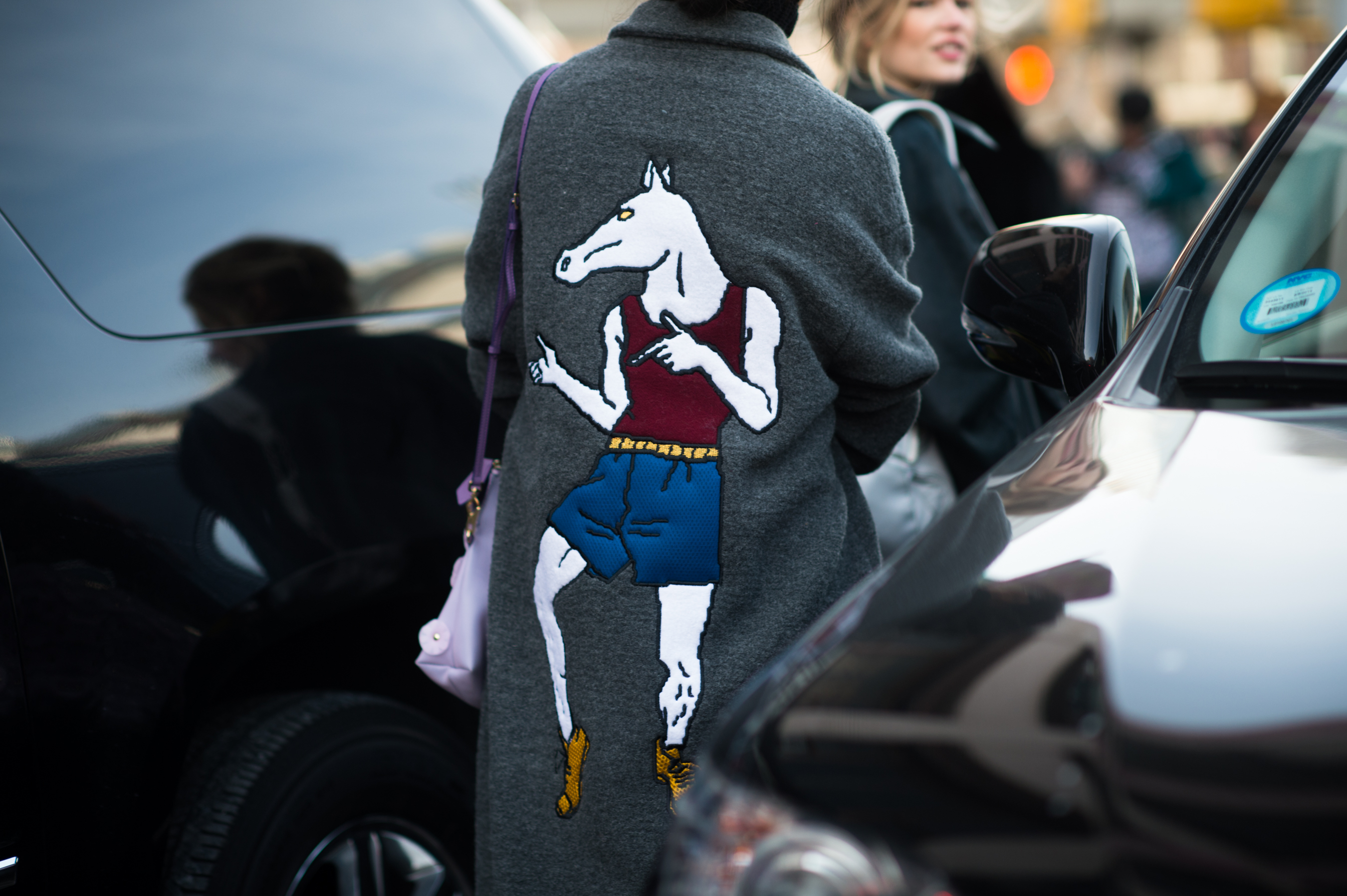 Chinese model wearing a funny coat