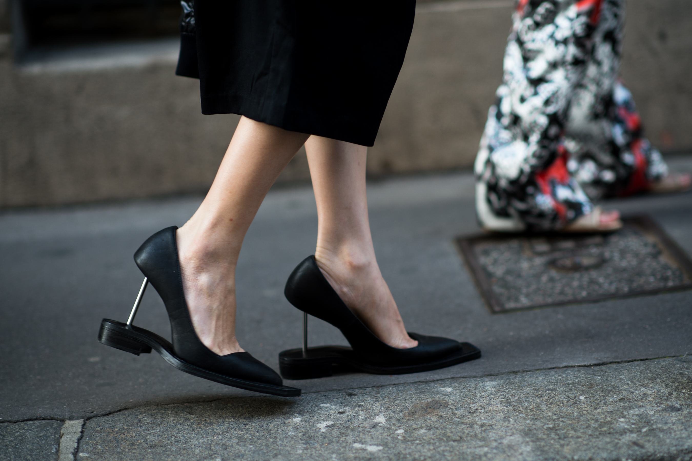 Woman wearing interesting black pumps