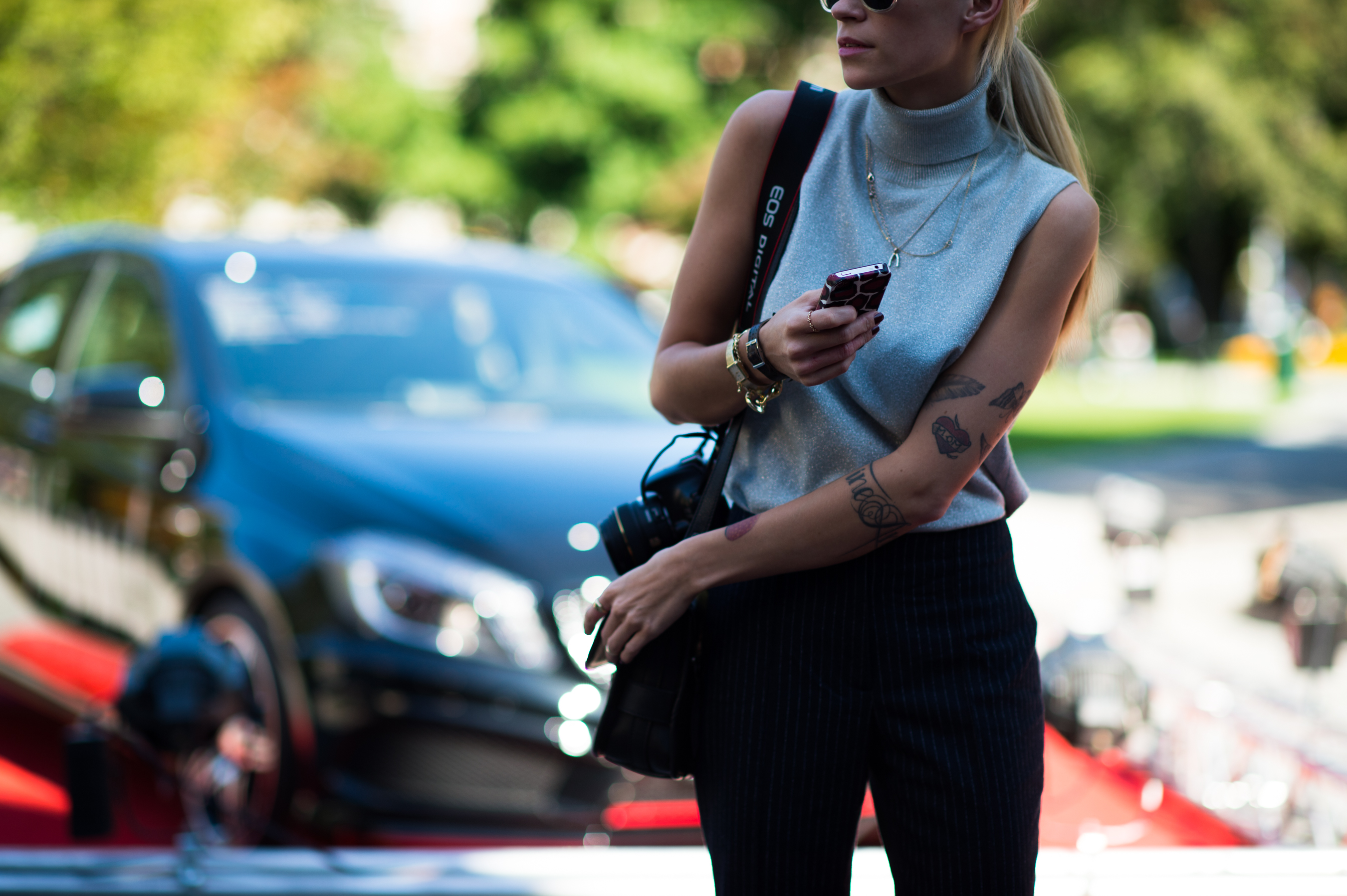 Photographer girl with cool tattoos