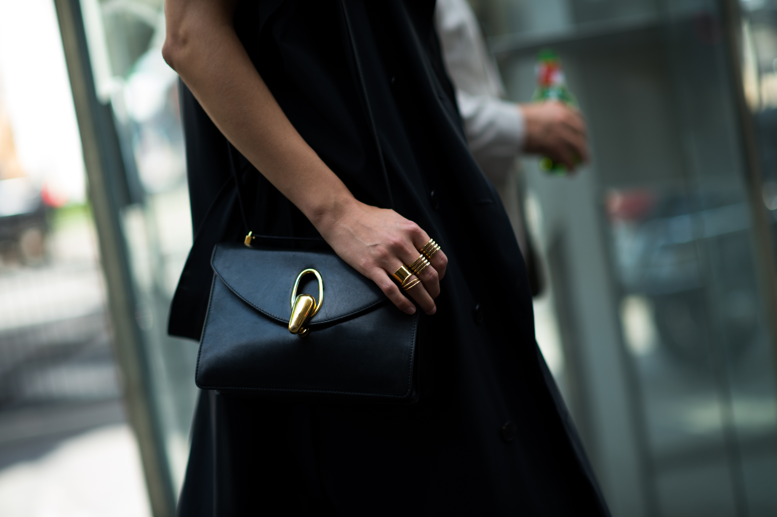 Editor with Balenciaga gold rings