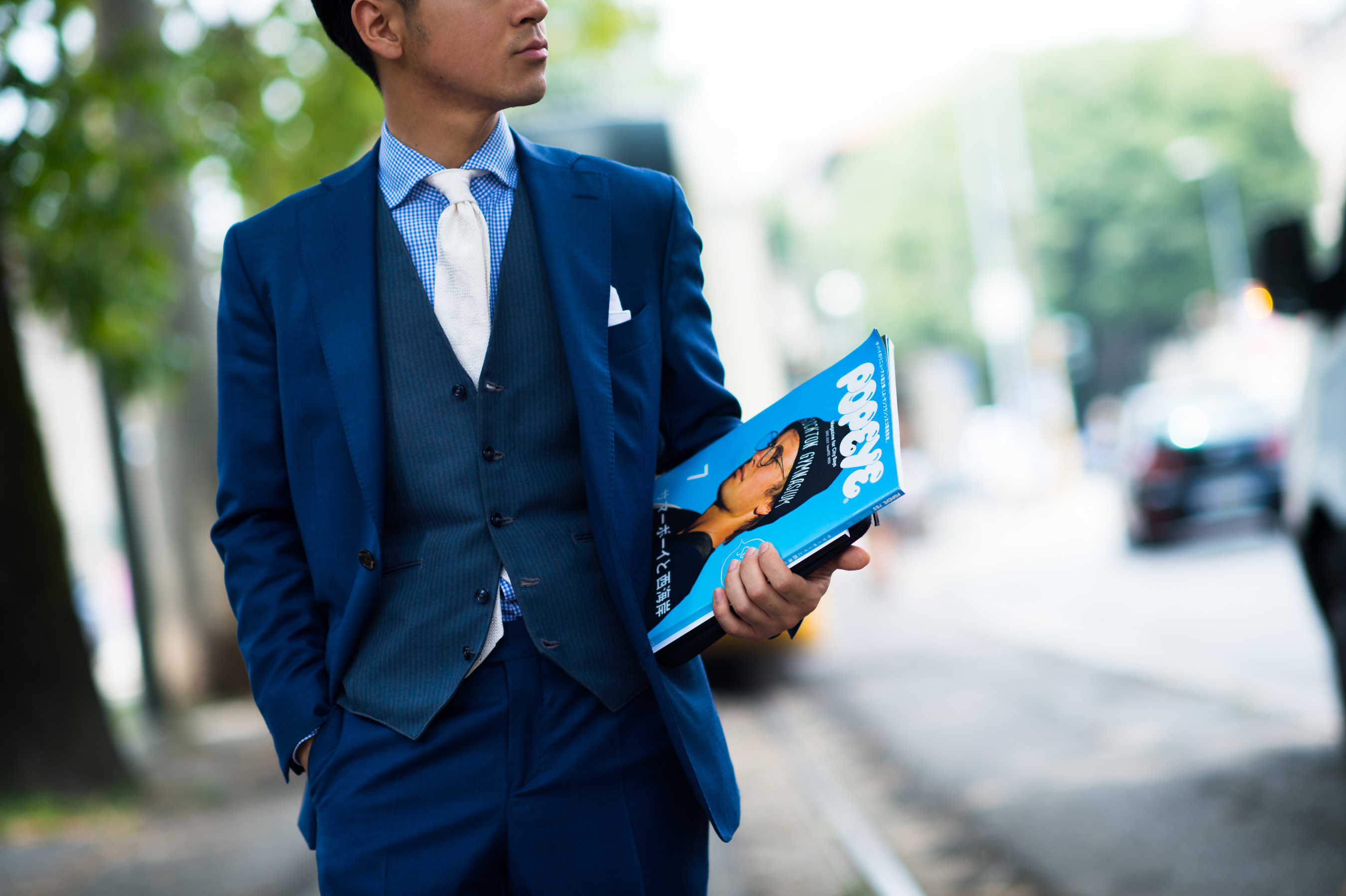 Japanese man wearing all blue
