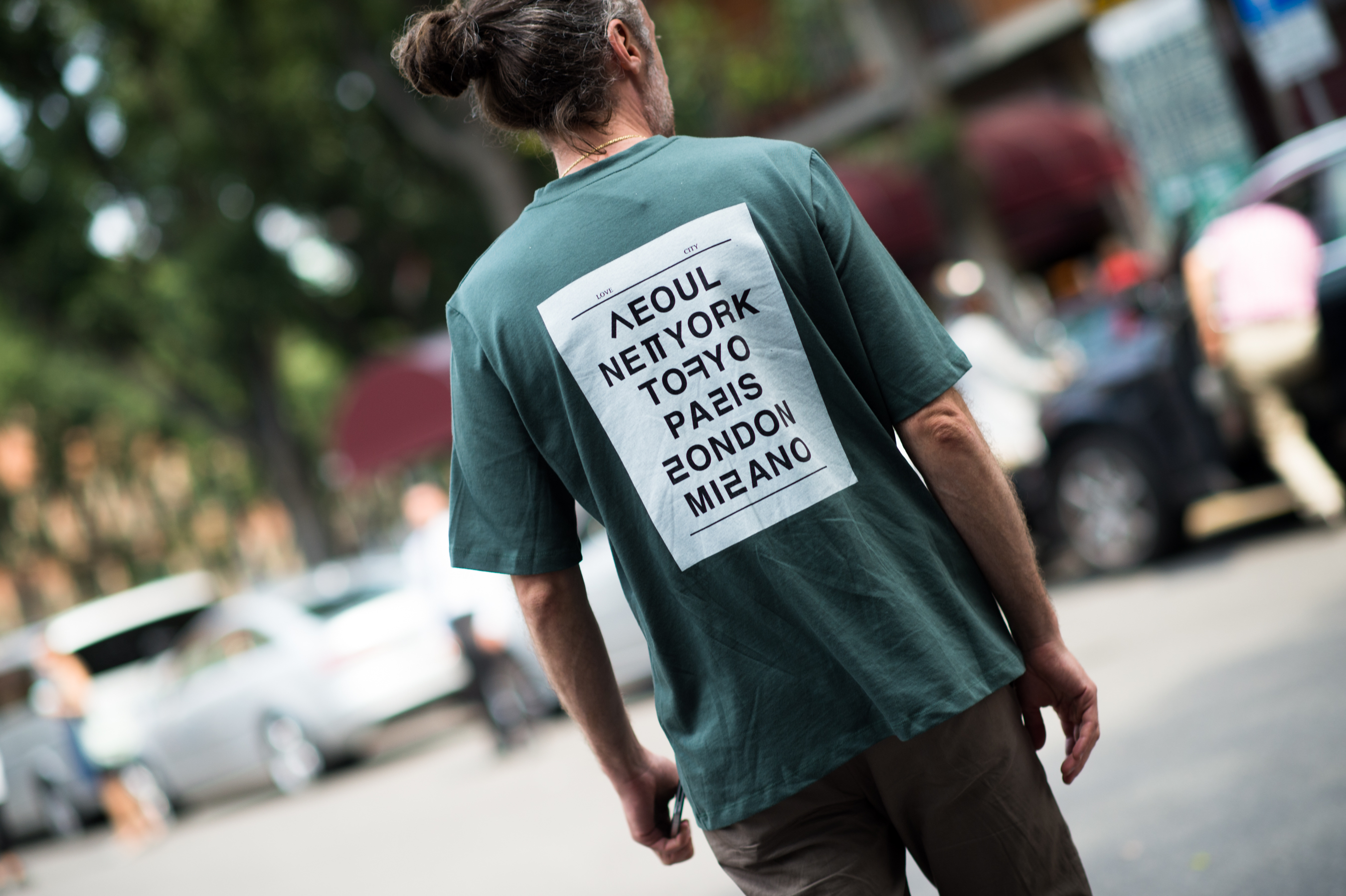 Italian man wearing a graphic T shirt