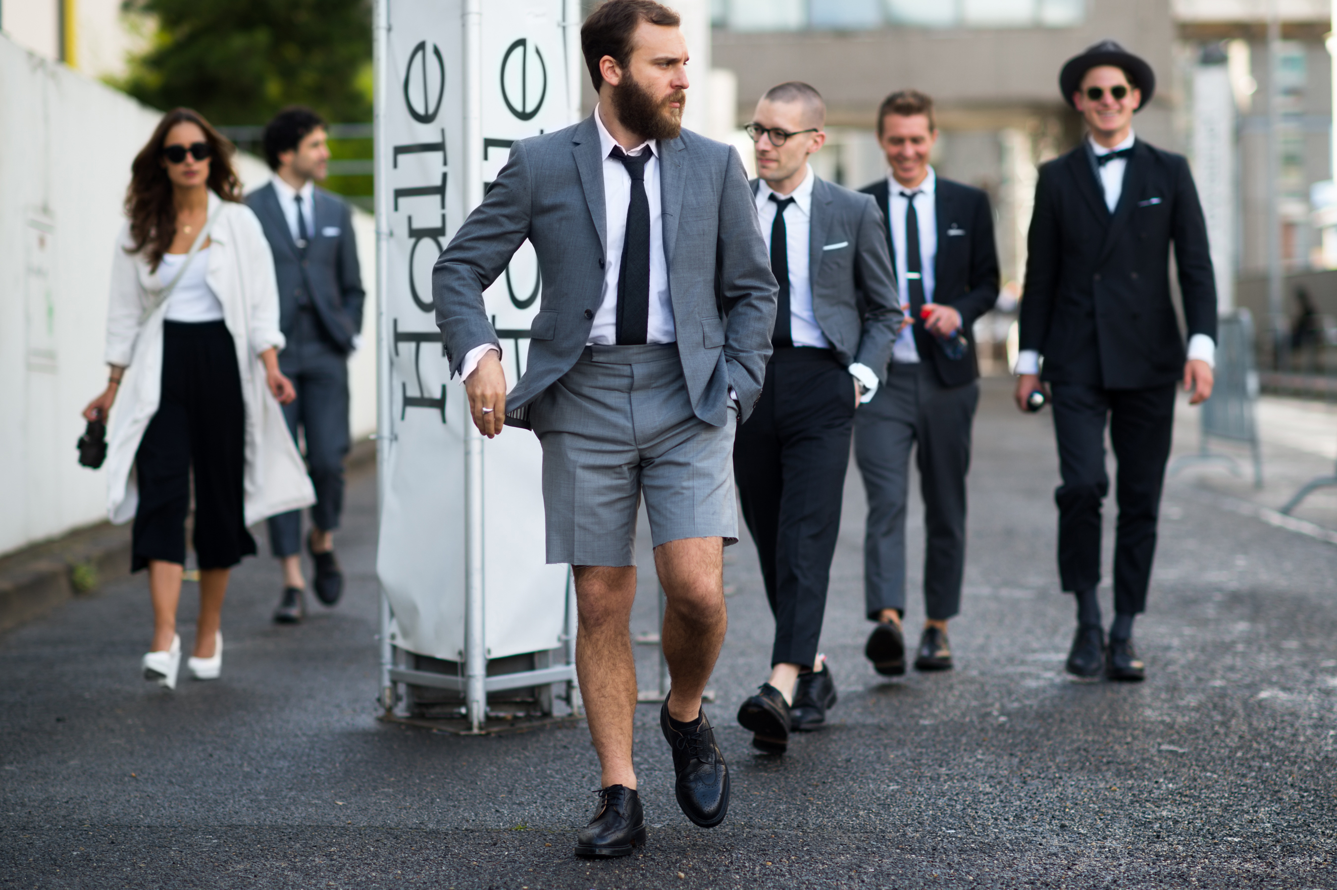 Men wearing grey suits in France