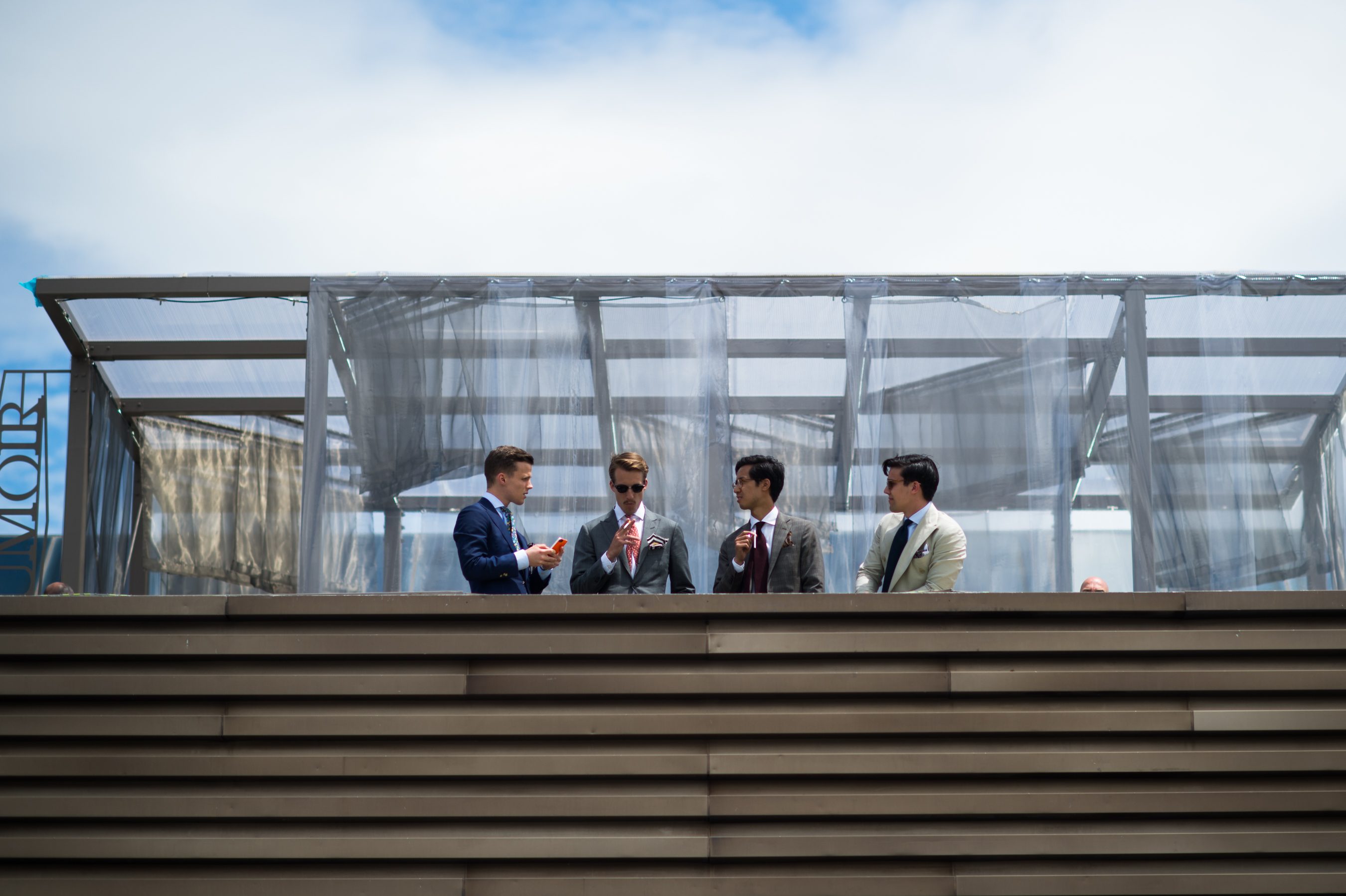 Four men at Pitti Immagine Uomo
