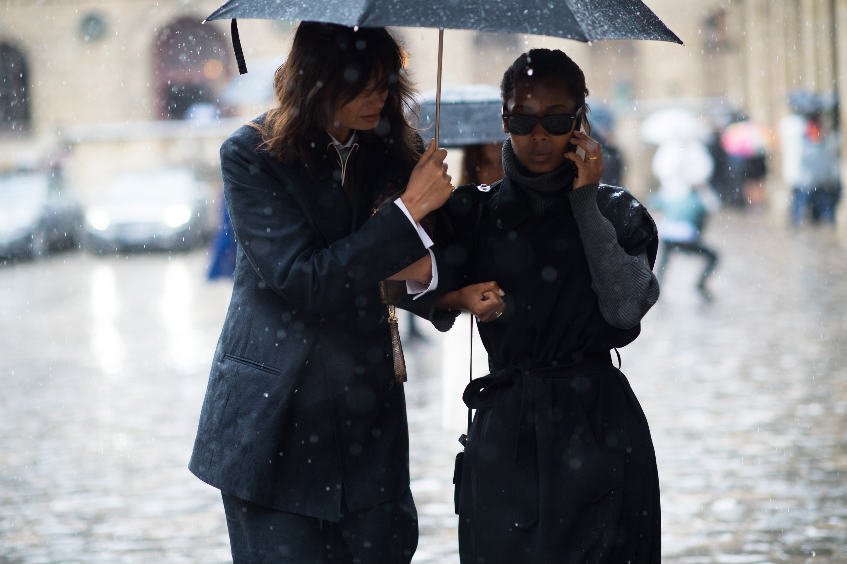 Two women in the rain