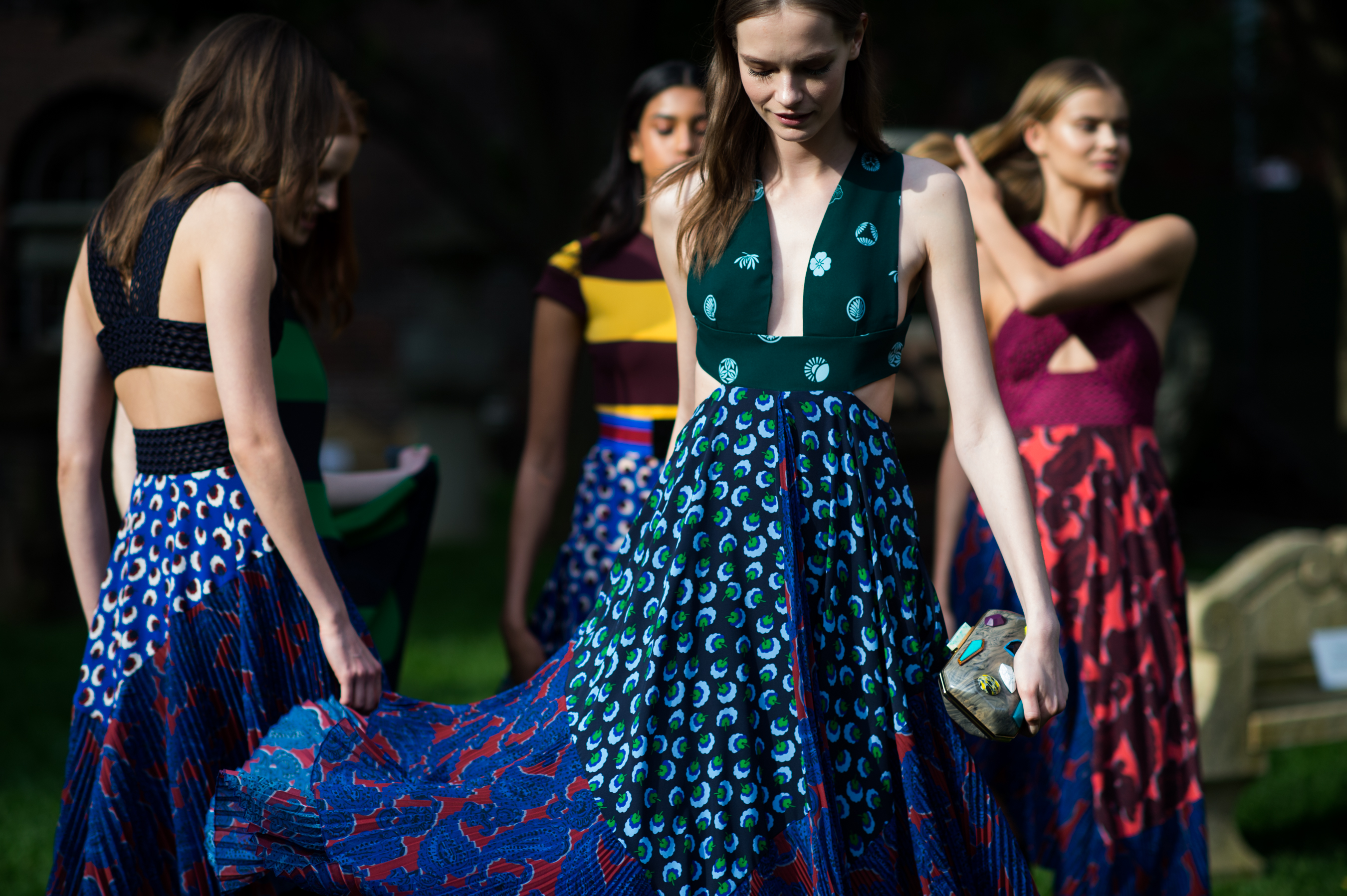 Models dancing at a garden party