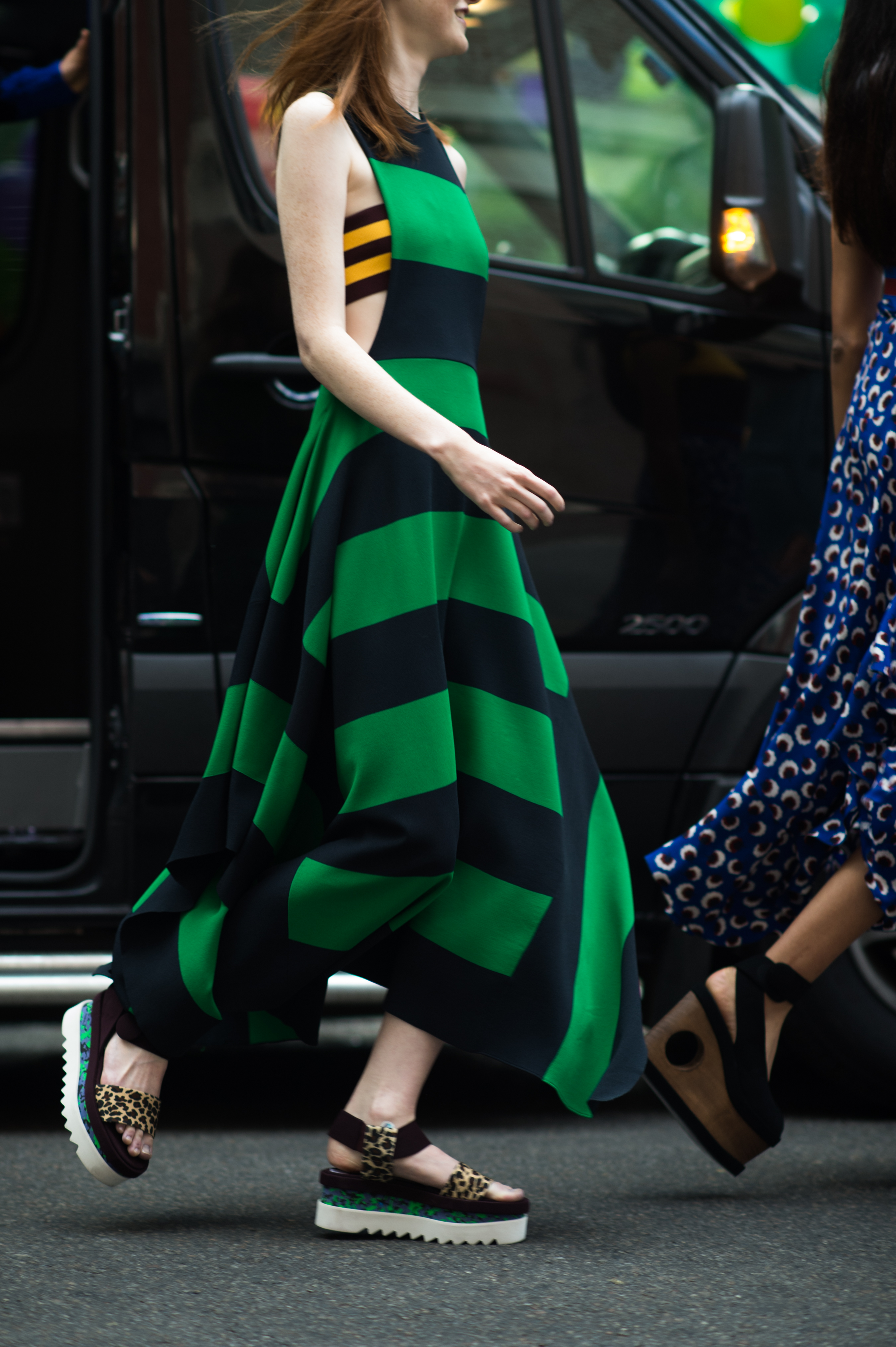 Polish model wearing a green striped dress