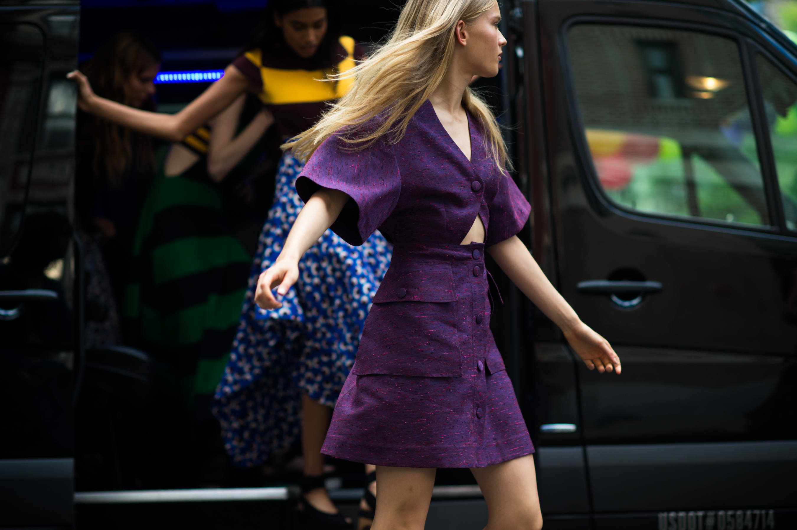Russian model wearing purple at a fashion show