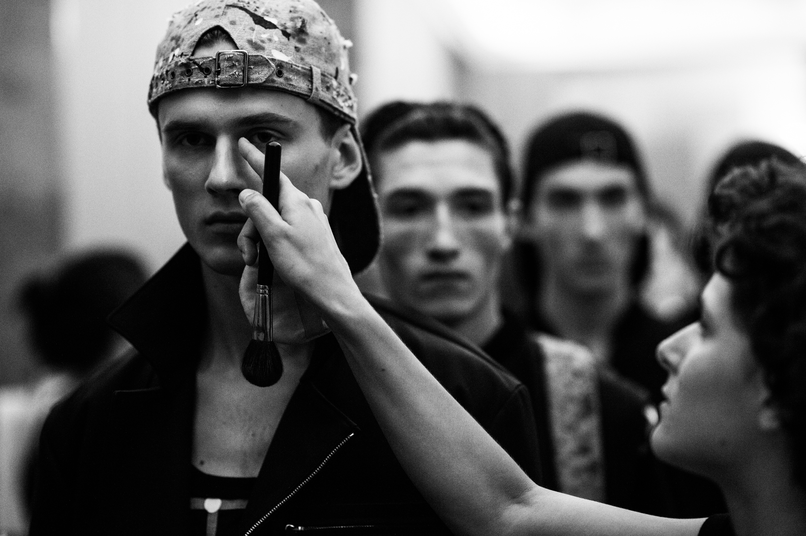 Male models in line-up before show