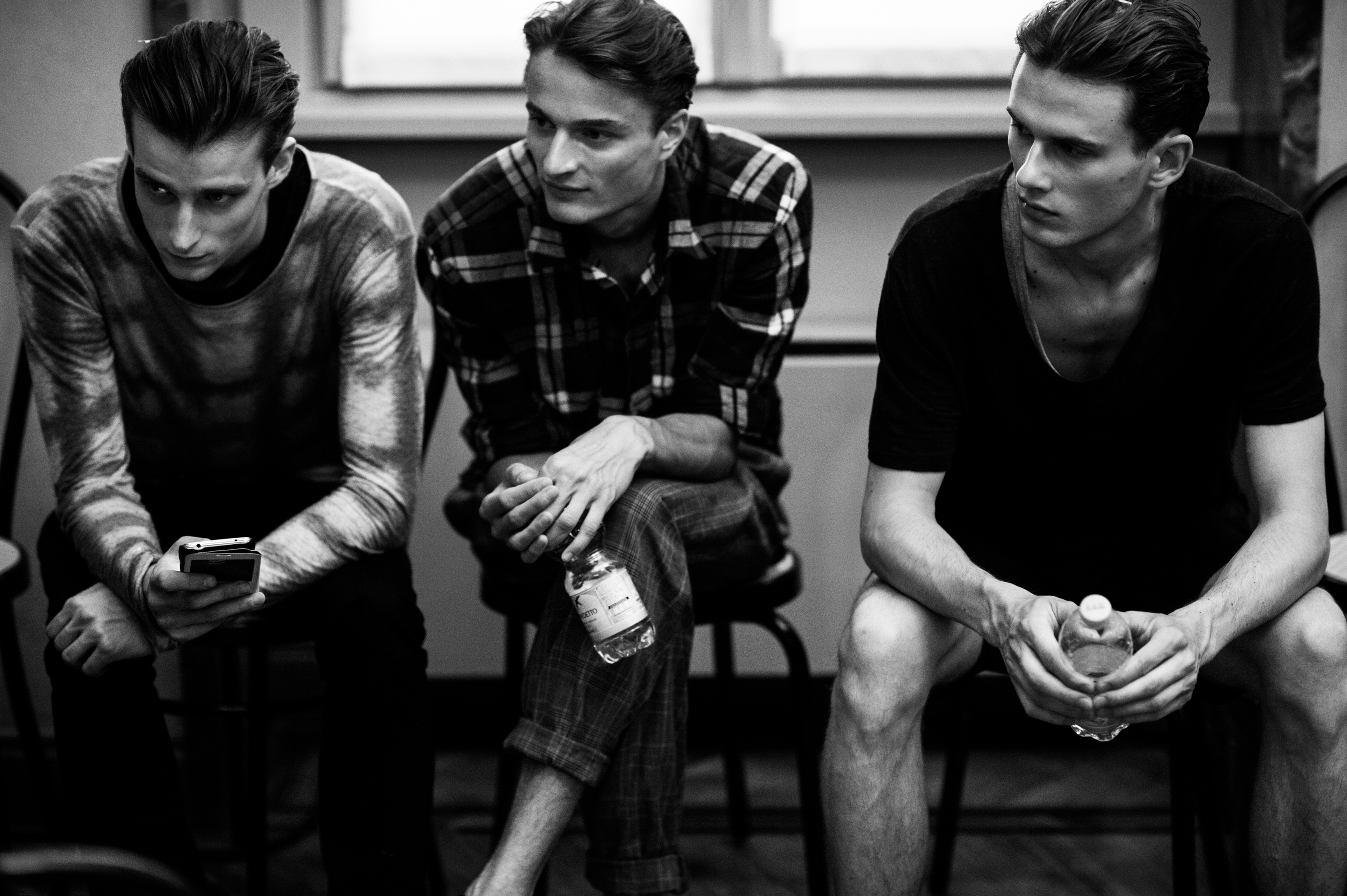 Three male models before fashion show