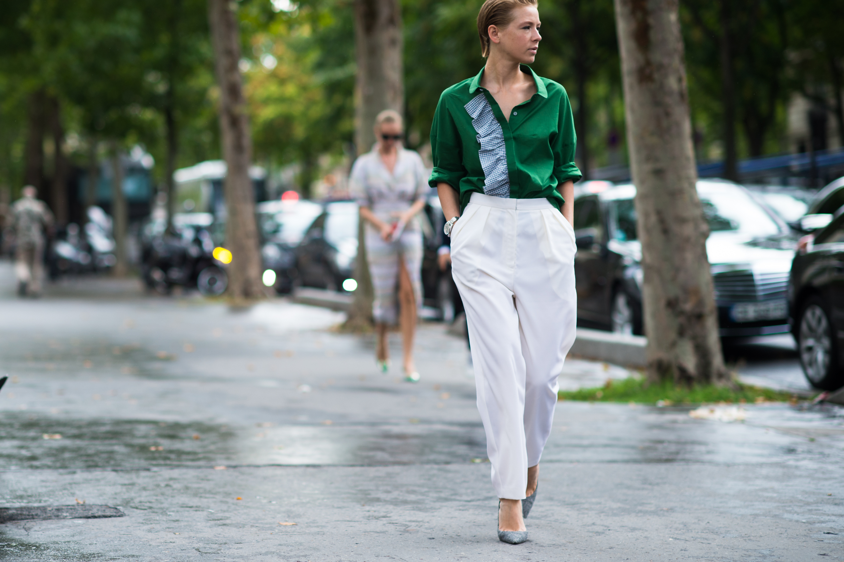 Russian designer wearing green and white
