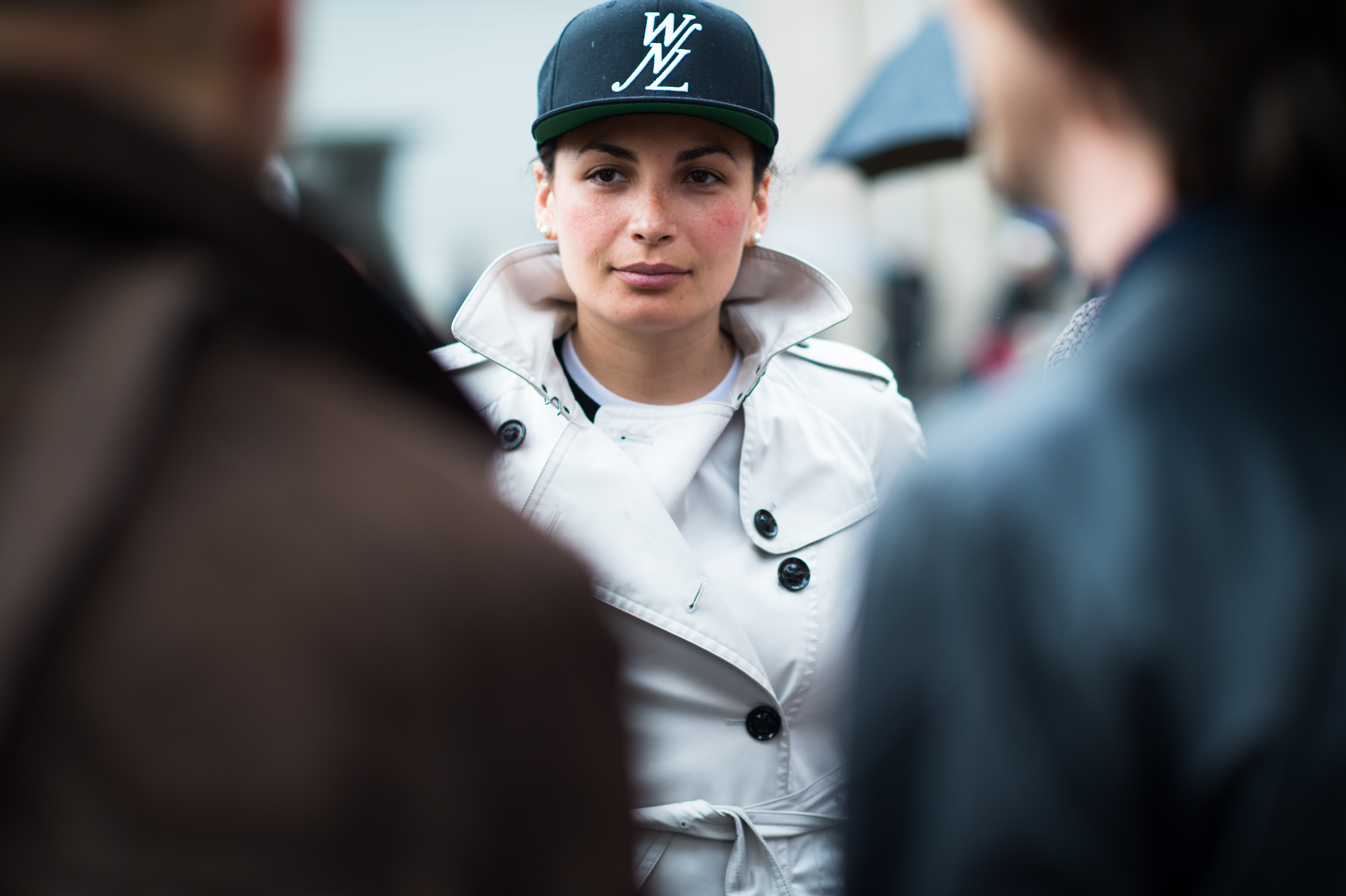 GQ France editor wearing WNL Public School hat