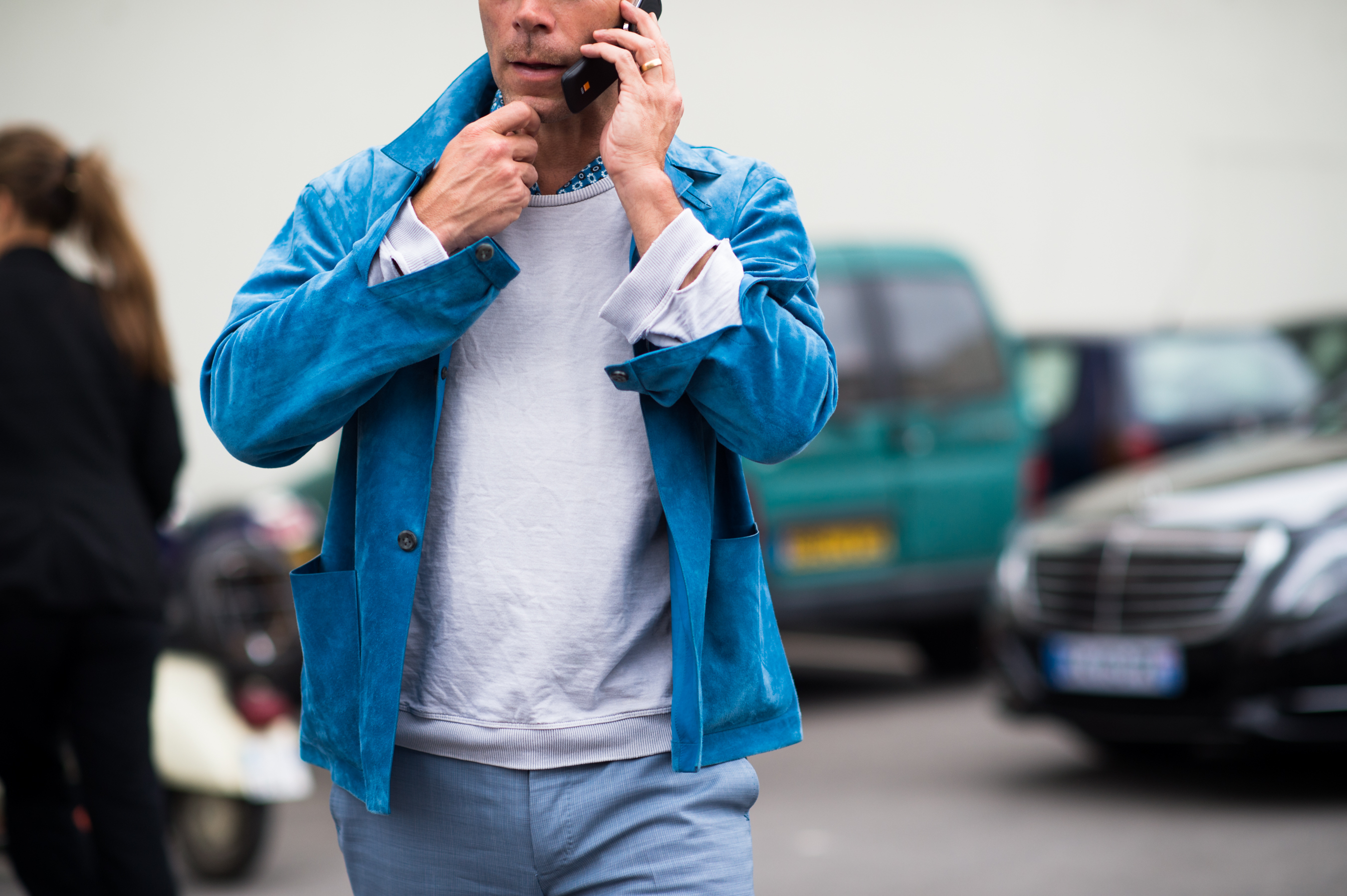 Man wearing a blue suede jacket
