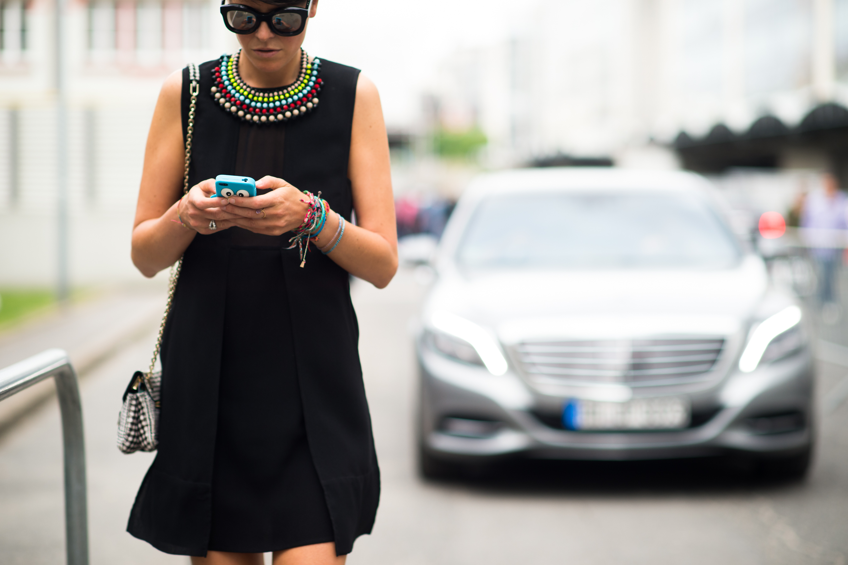 Italian stylist wearing mirror sunglasses