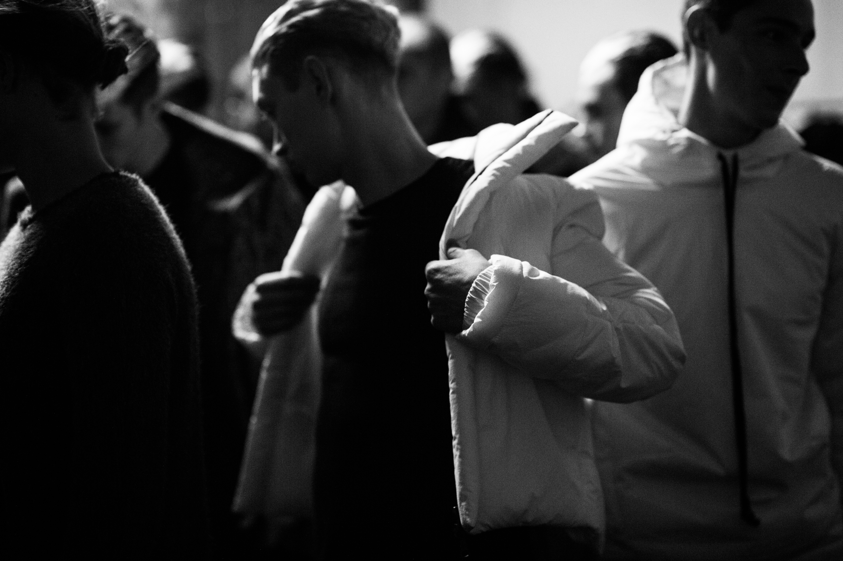 Male model wearing a white jacket