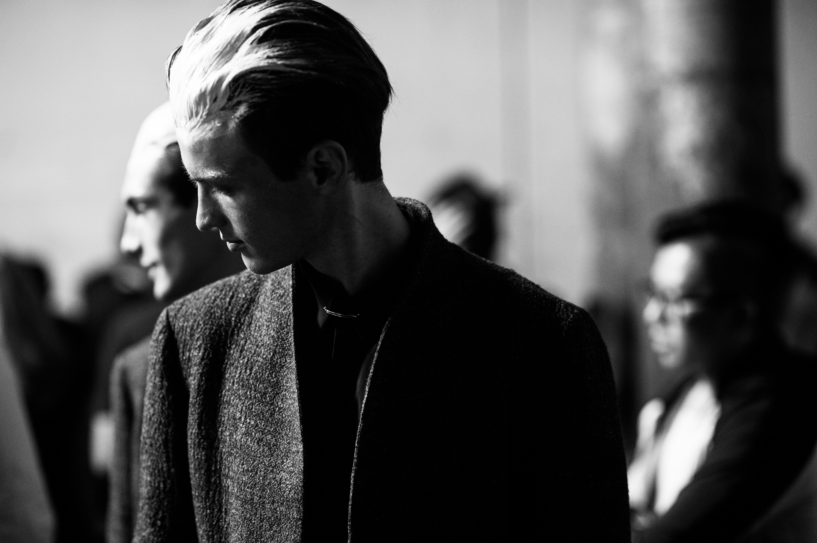 Male models before a fashion show