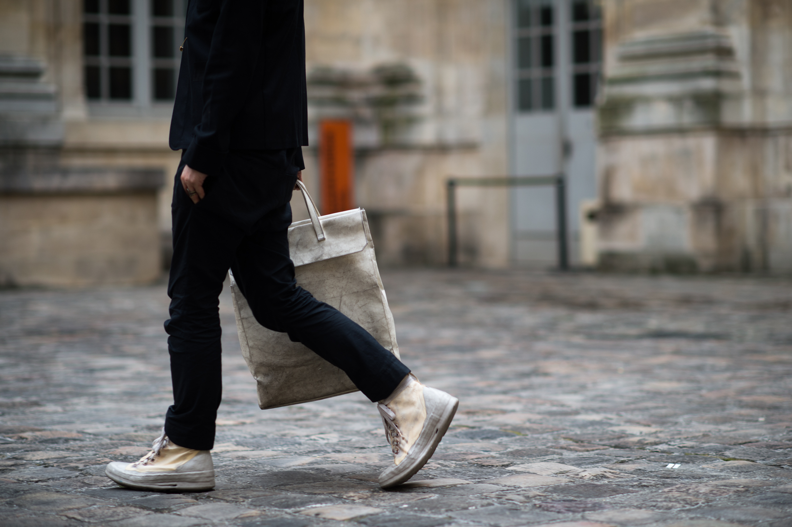 Man wearing Carol Christian Poell sneakers
