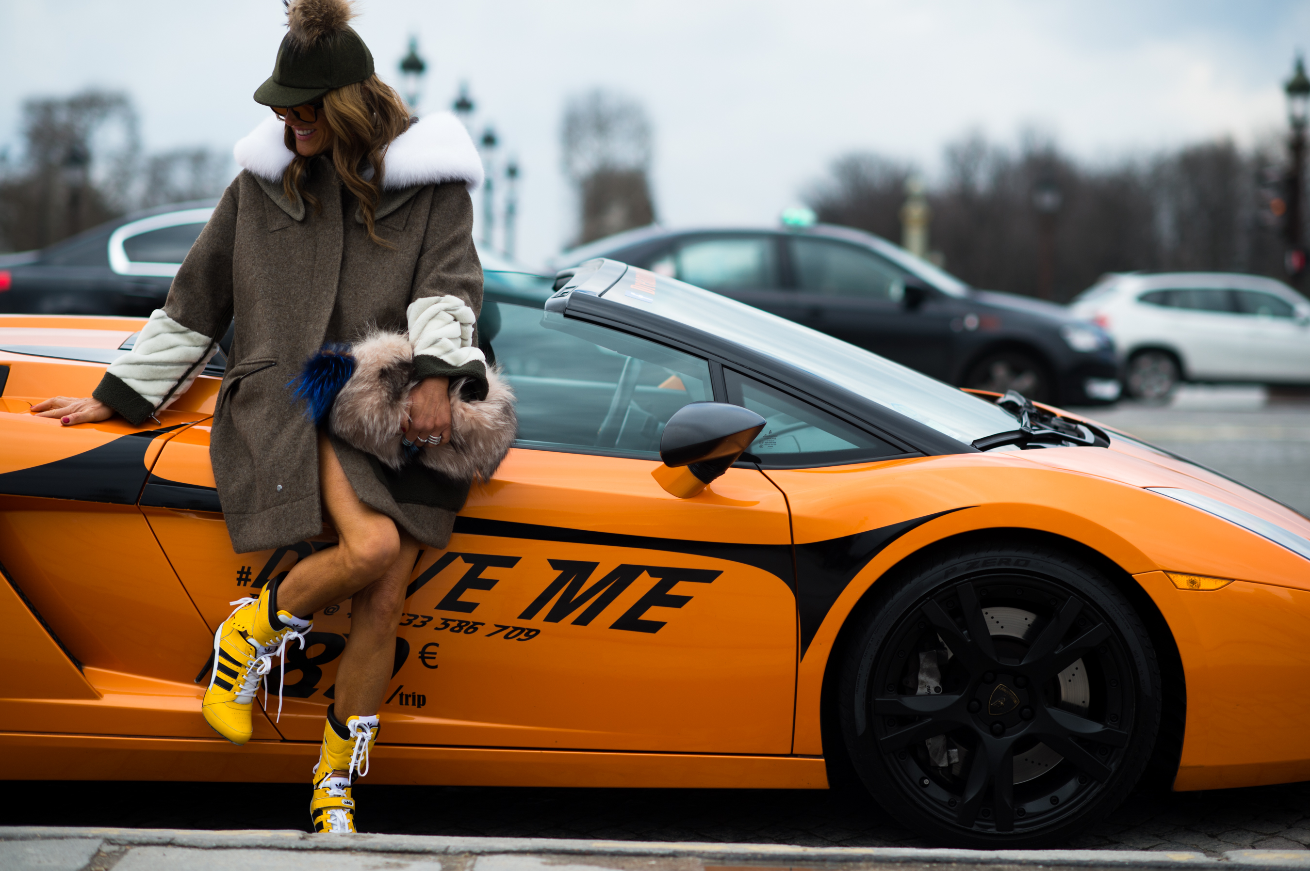Italian woman on a Lamborghini Gallardo