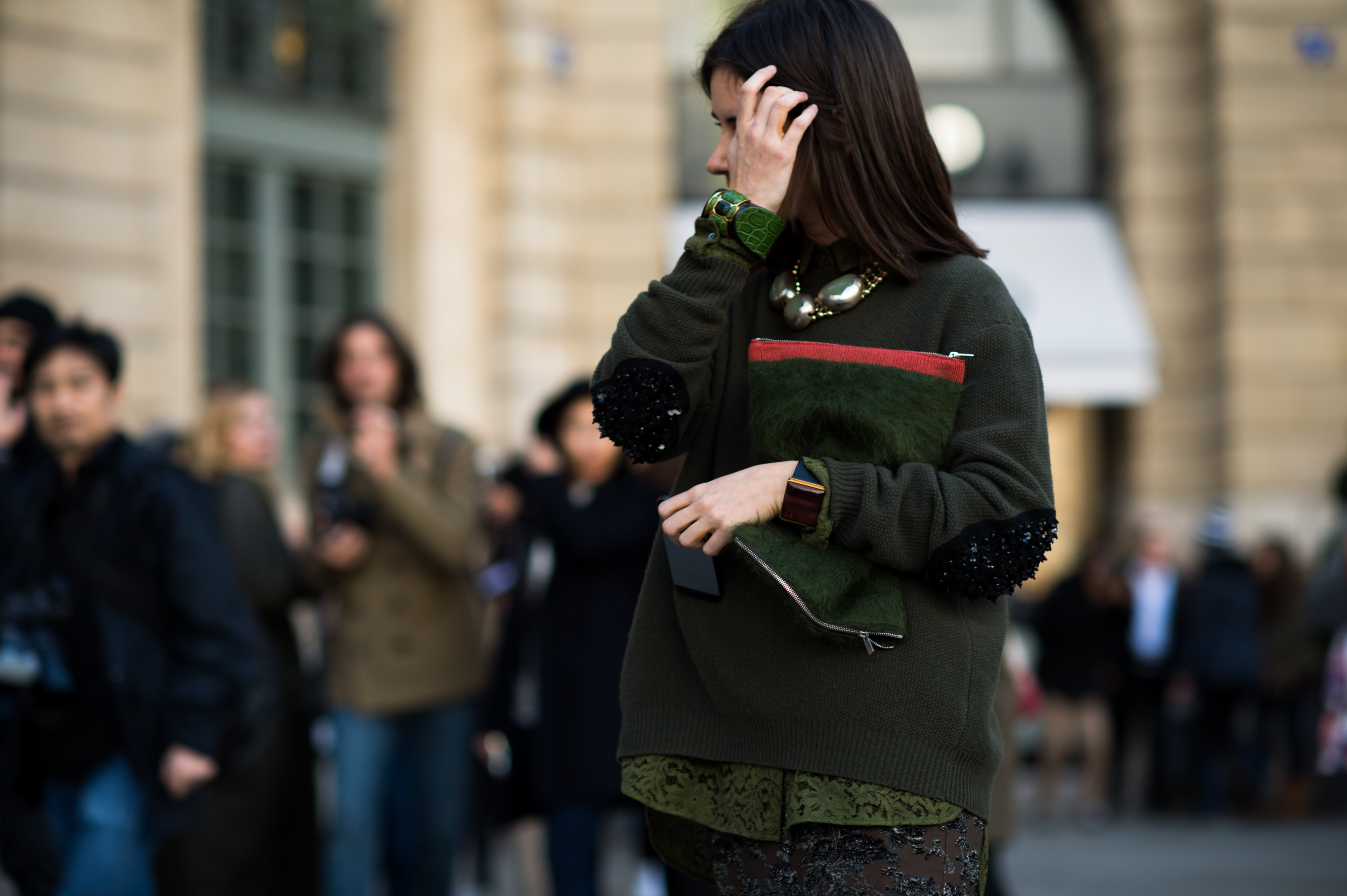Russian girl wearing all green with chunky jewelry