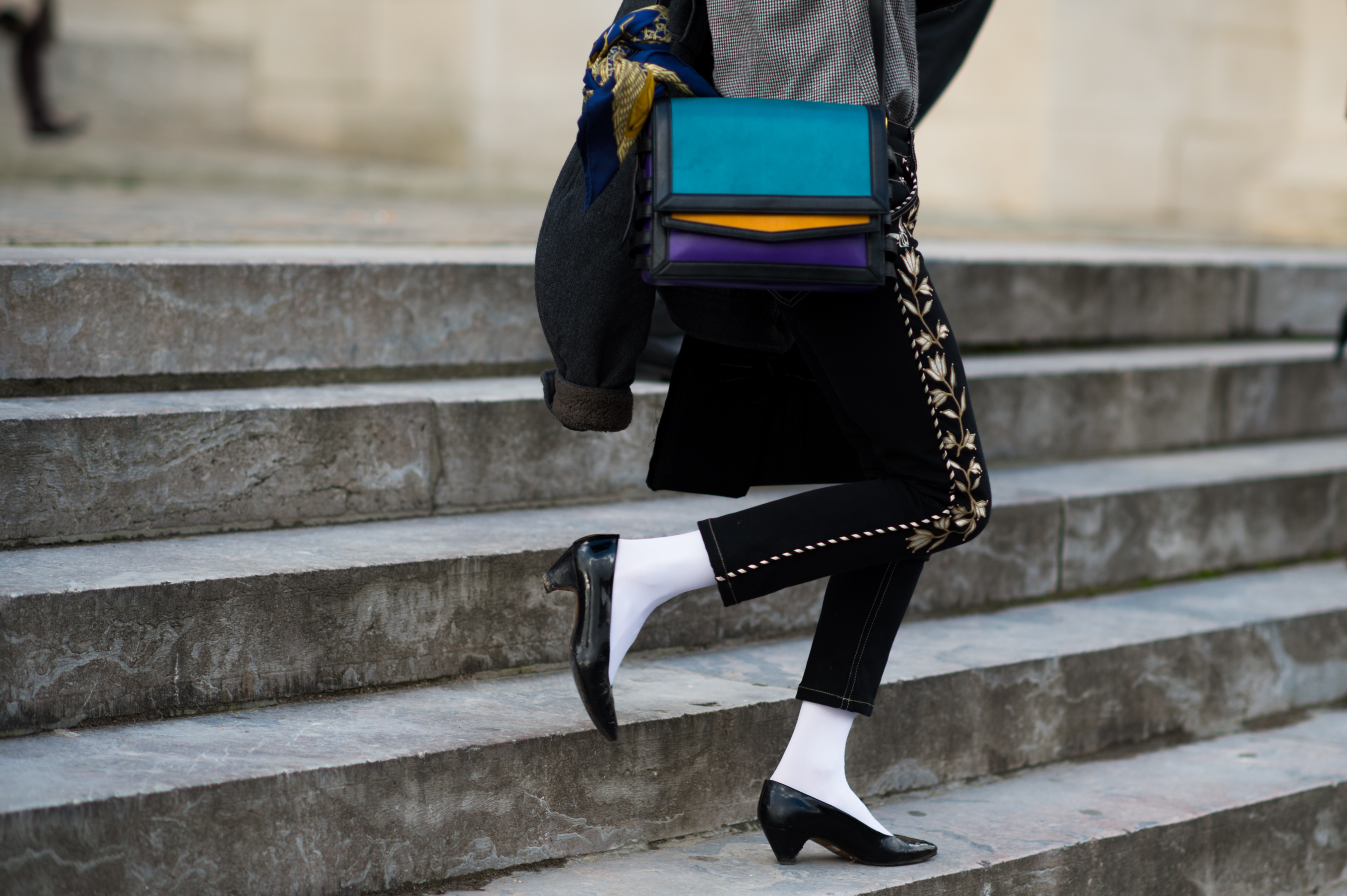 Woman wearing black shoes and white sox