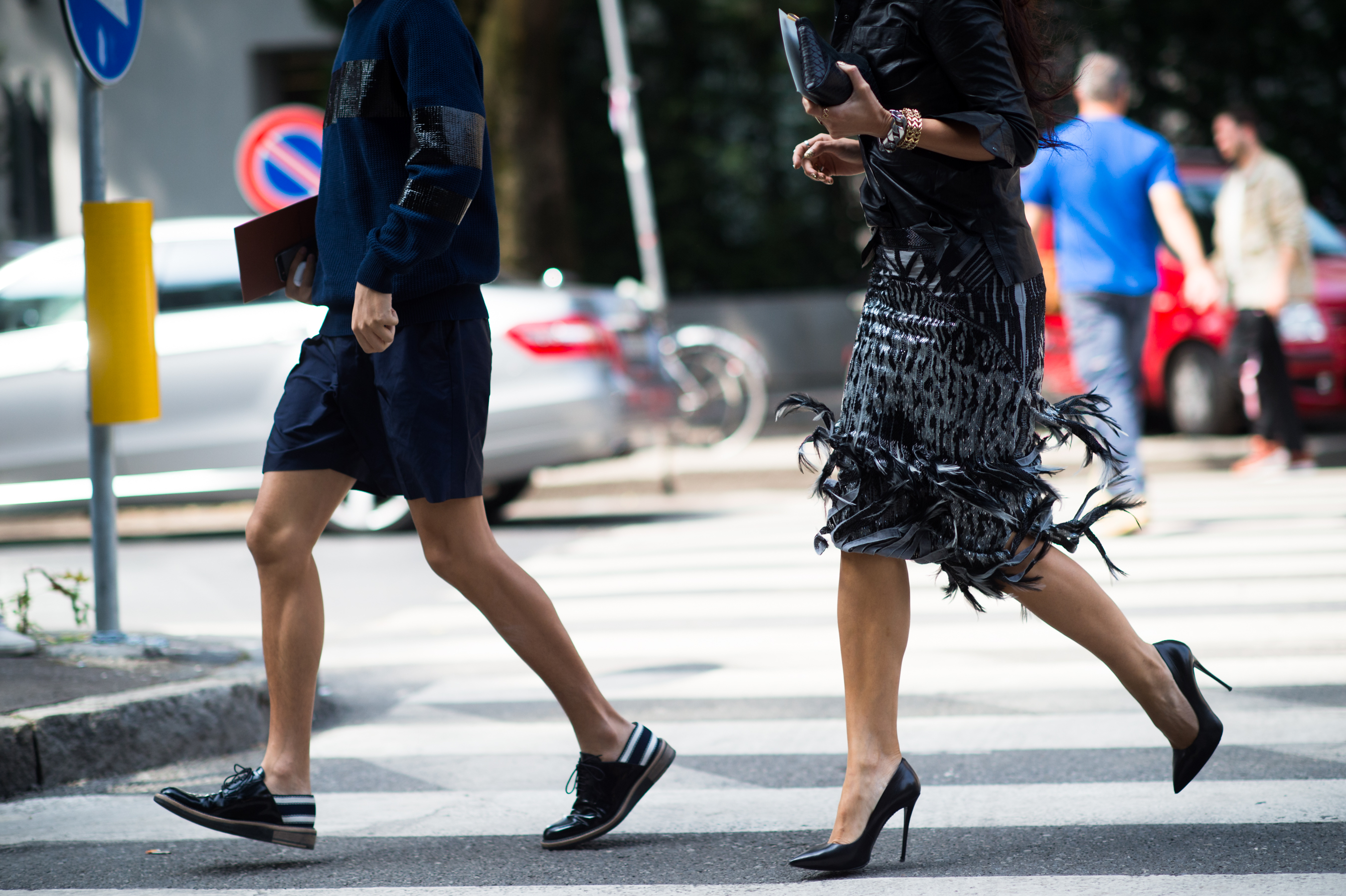 Man and woman running into a fashion show