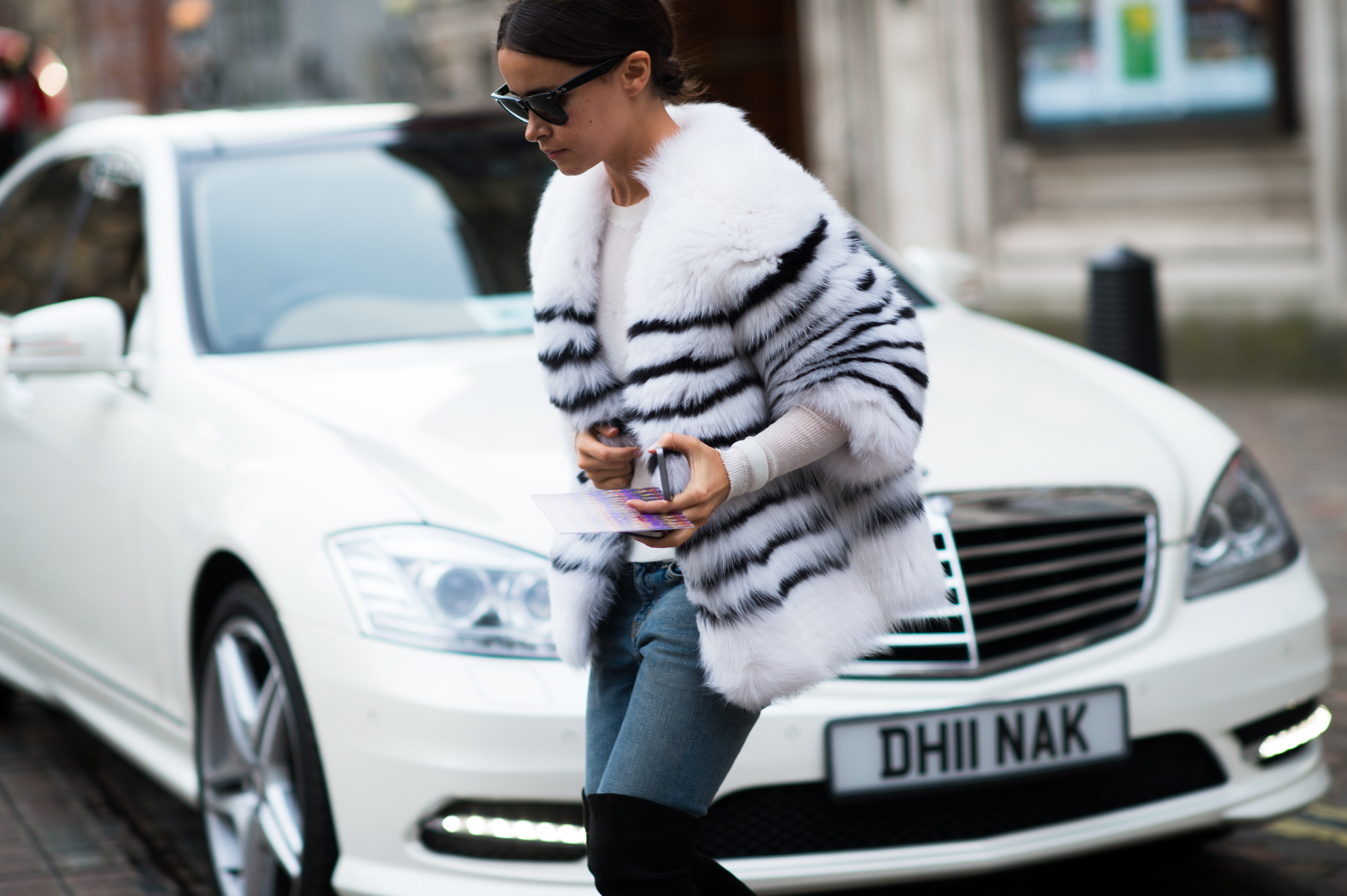 Russian Buro 24/7 editor wearing striped fur