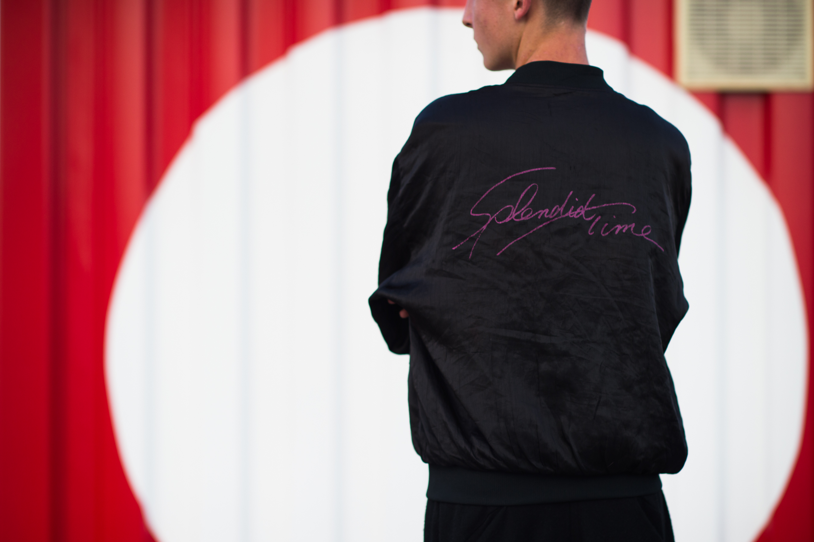 Kiwi man wearing a Splendid Time bomber