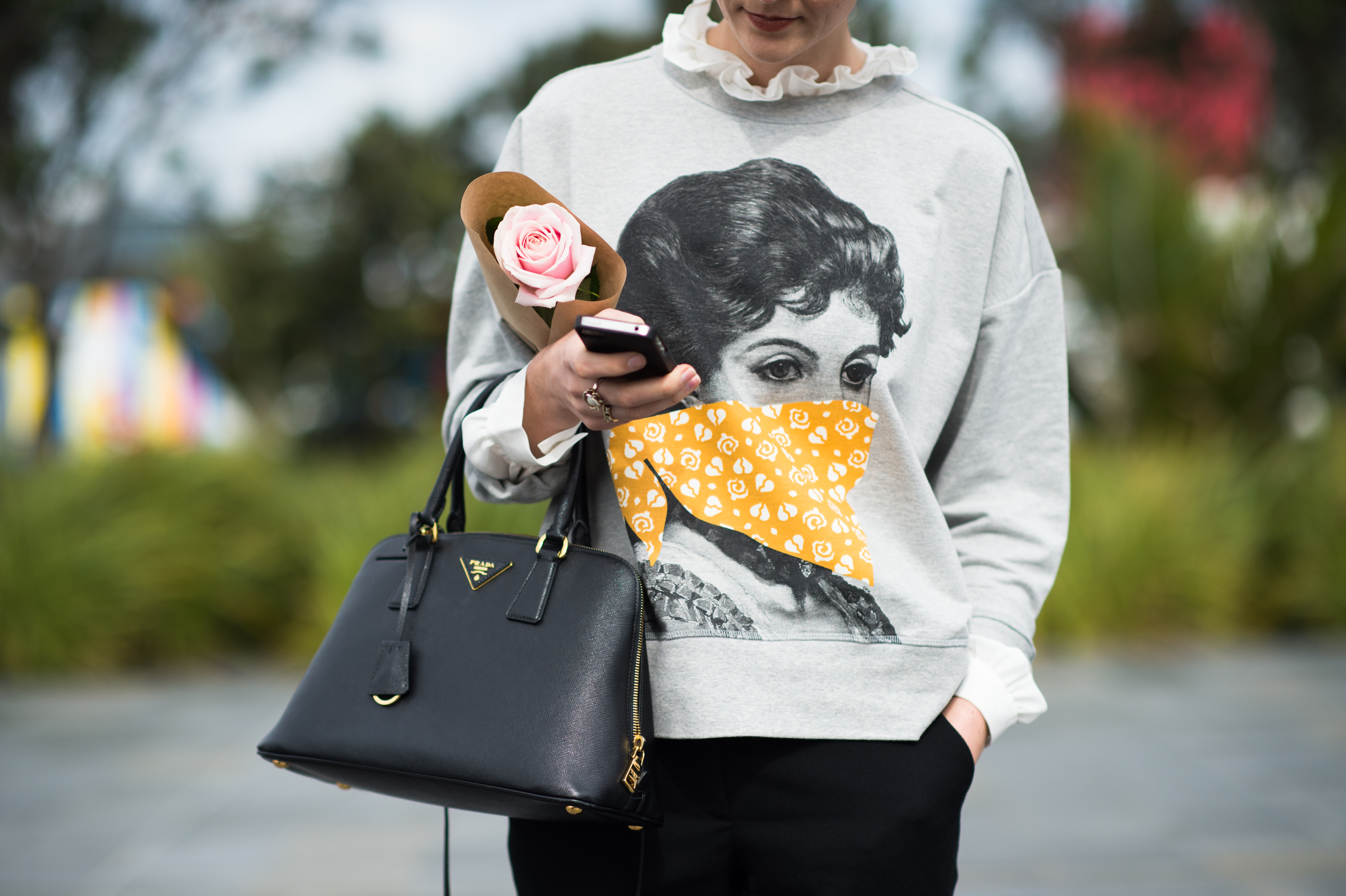 Woman wearing a Karen Walker jumper
