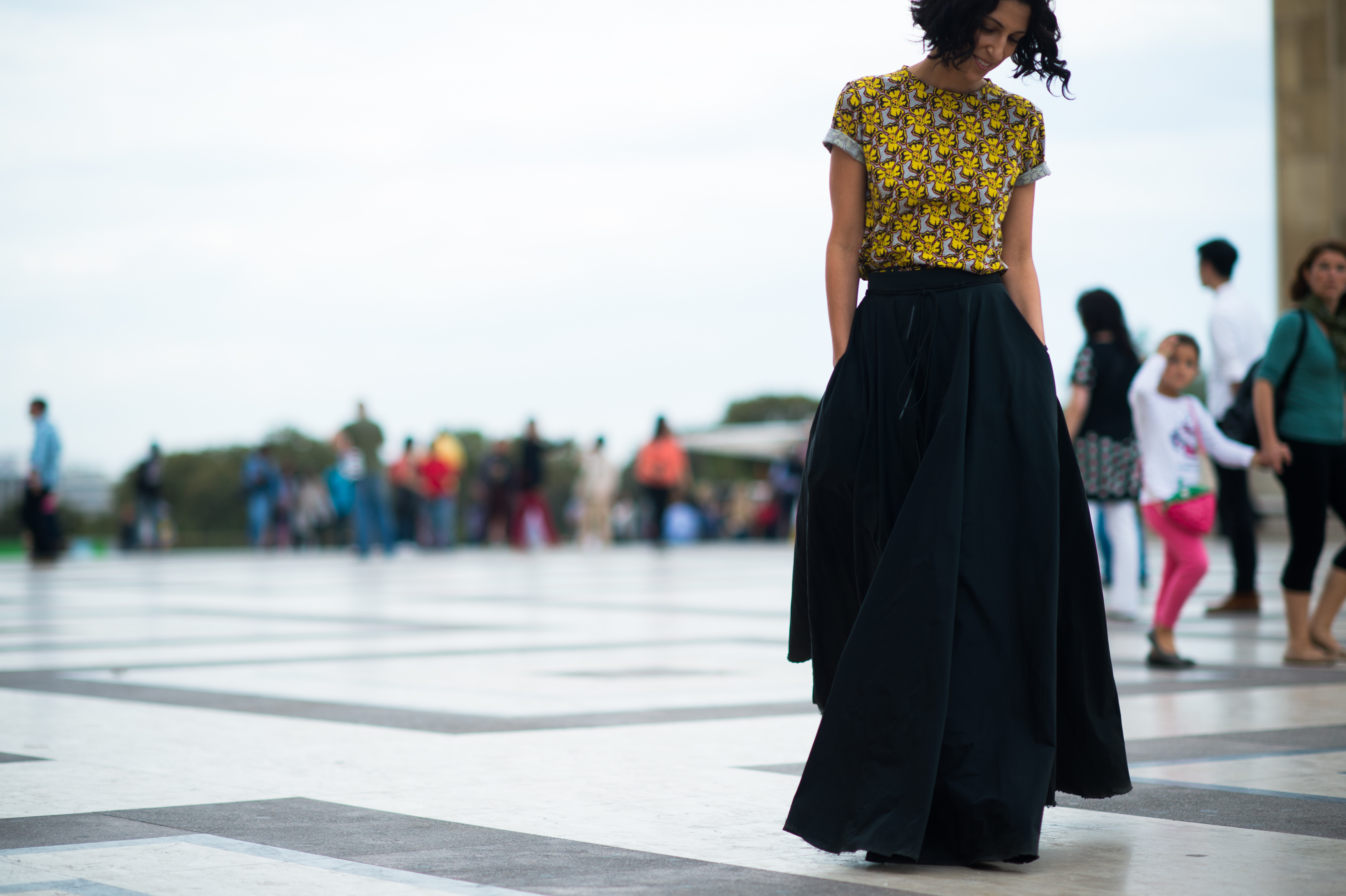 Stylist wearing a long black skirt