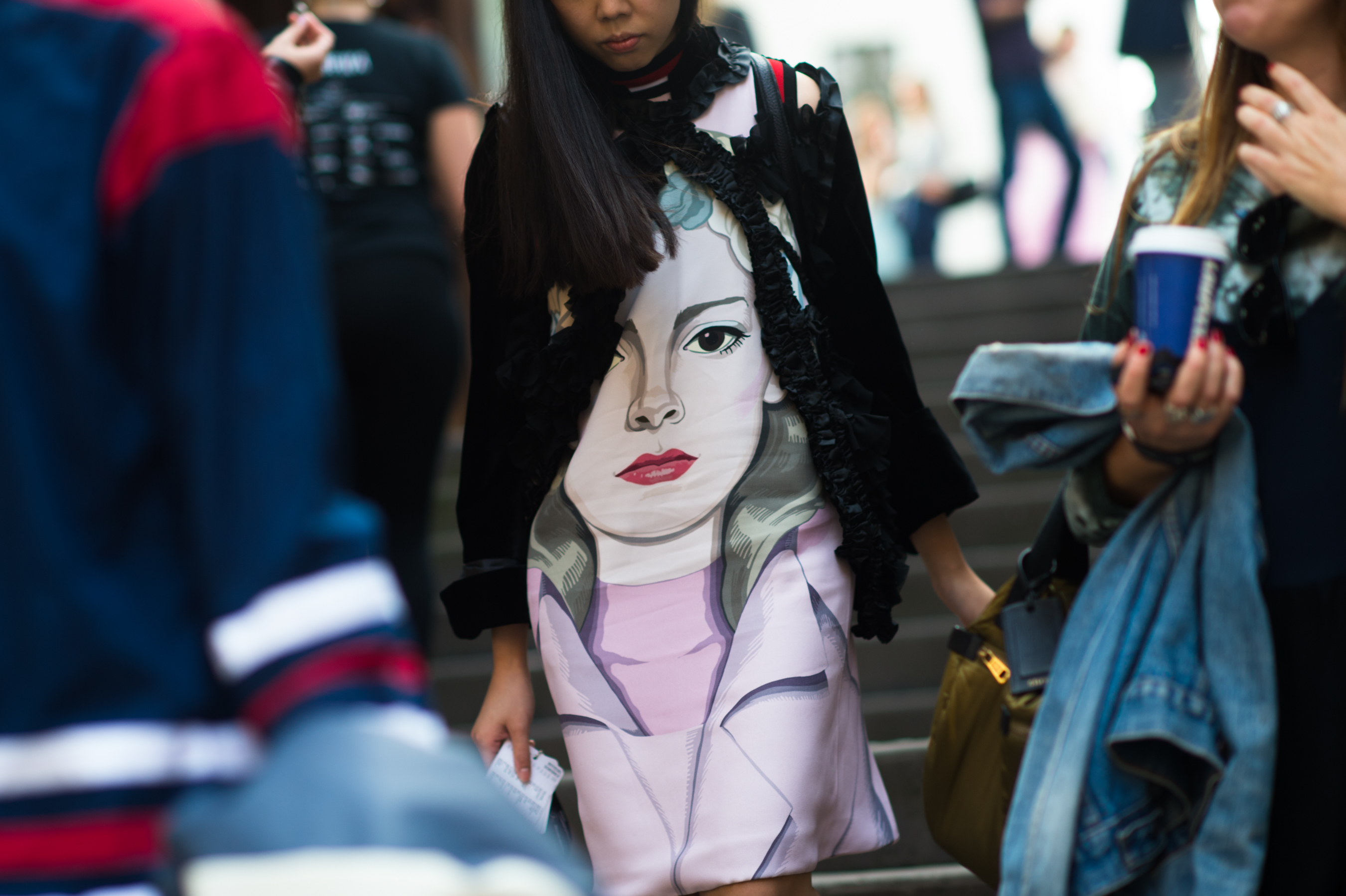 Susie Bubble wearing a Prada face dress