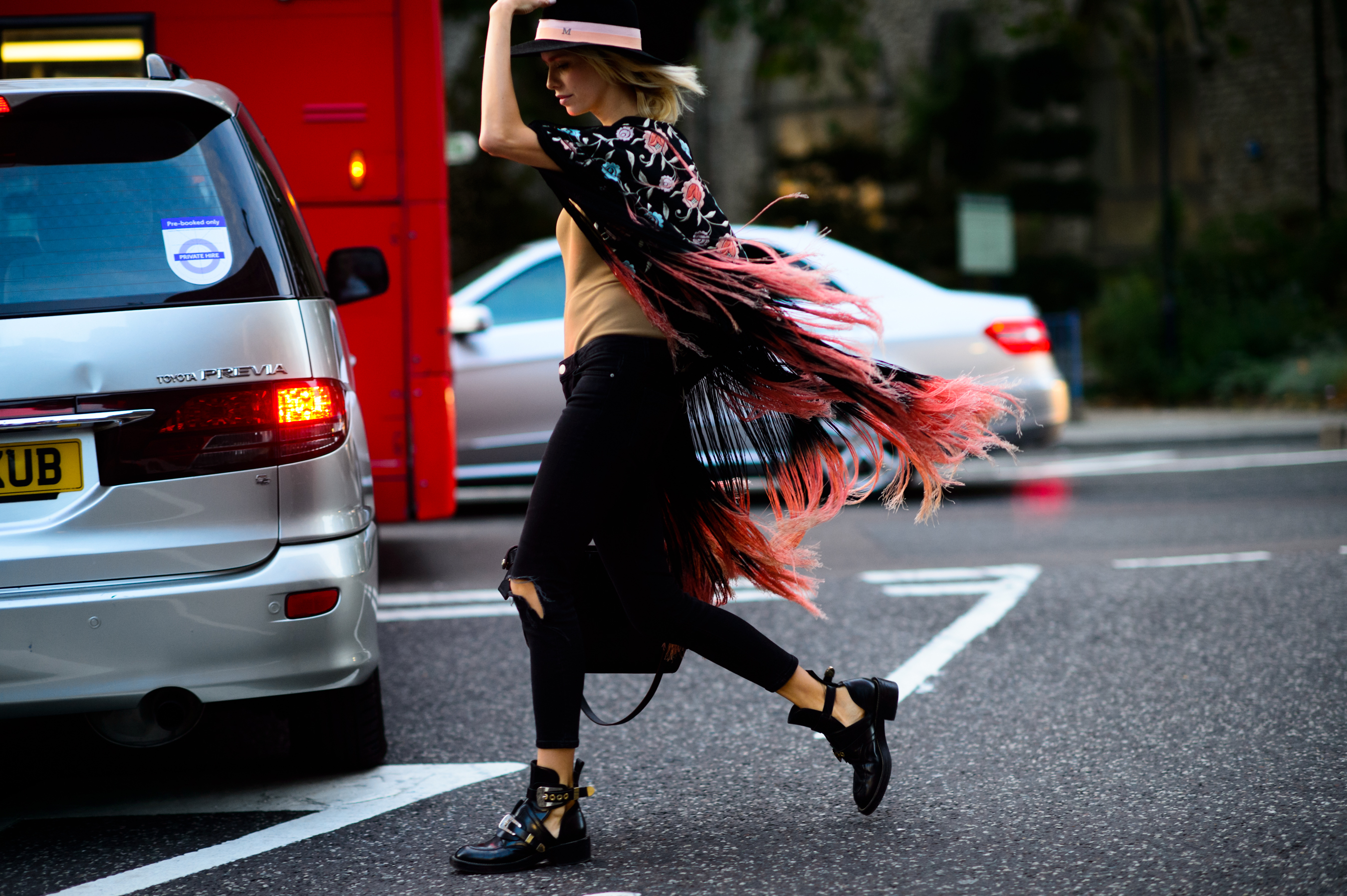 Russian woman crossing the street at LFW