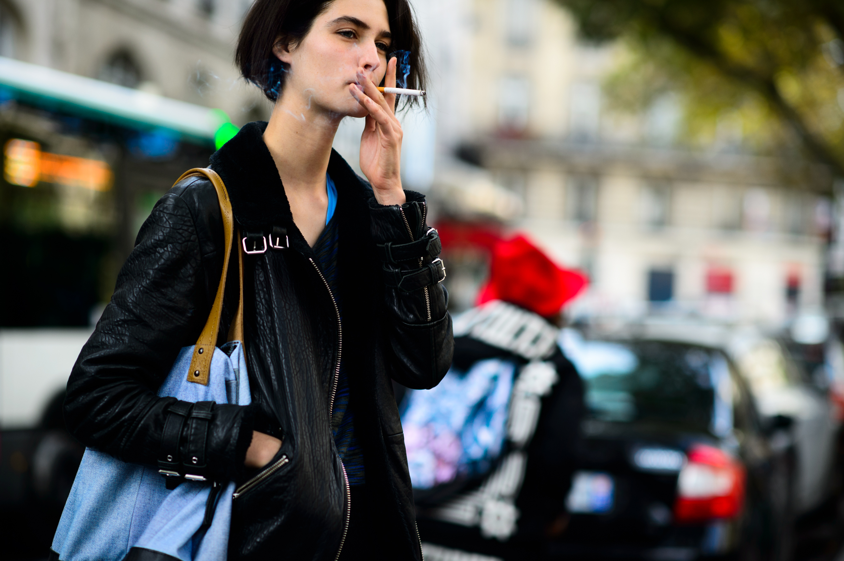 French model smoking after a show