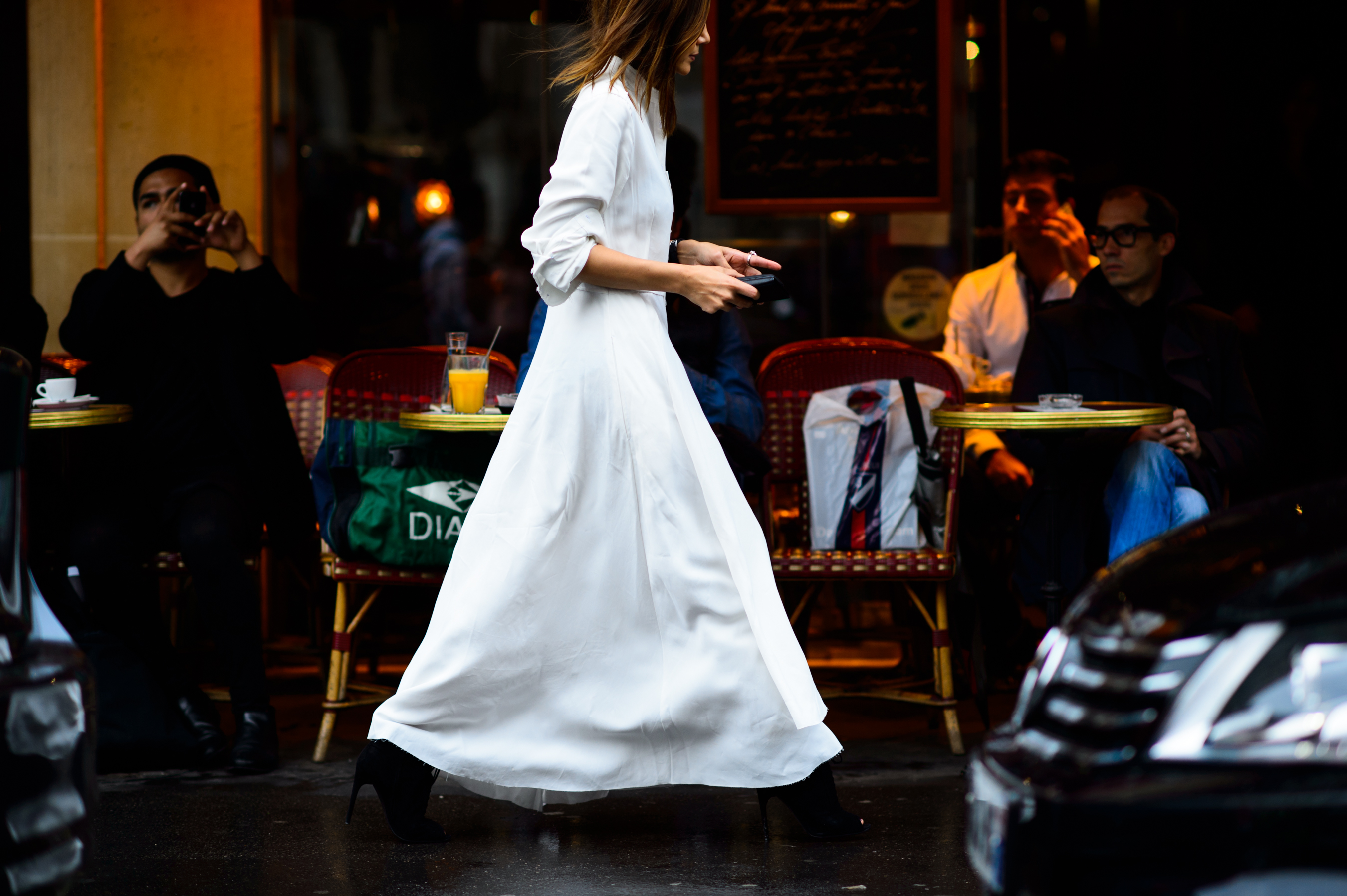 Australian editor wearing a white dress