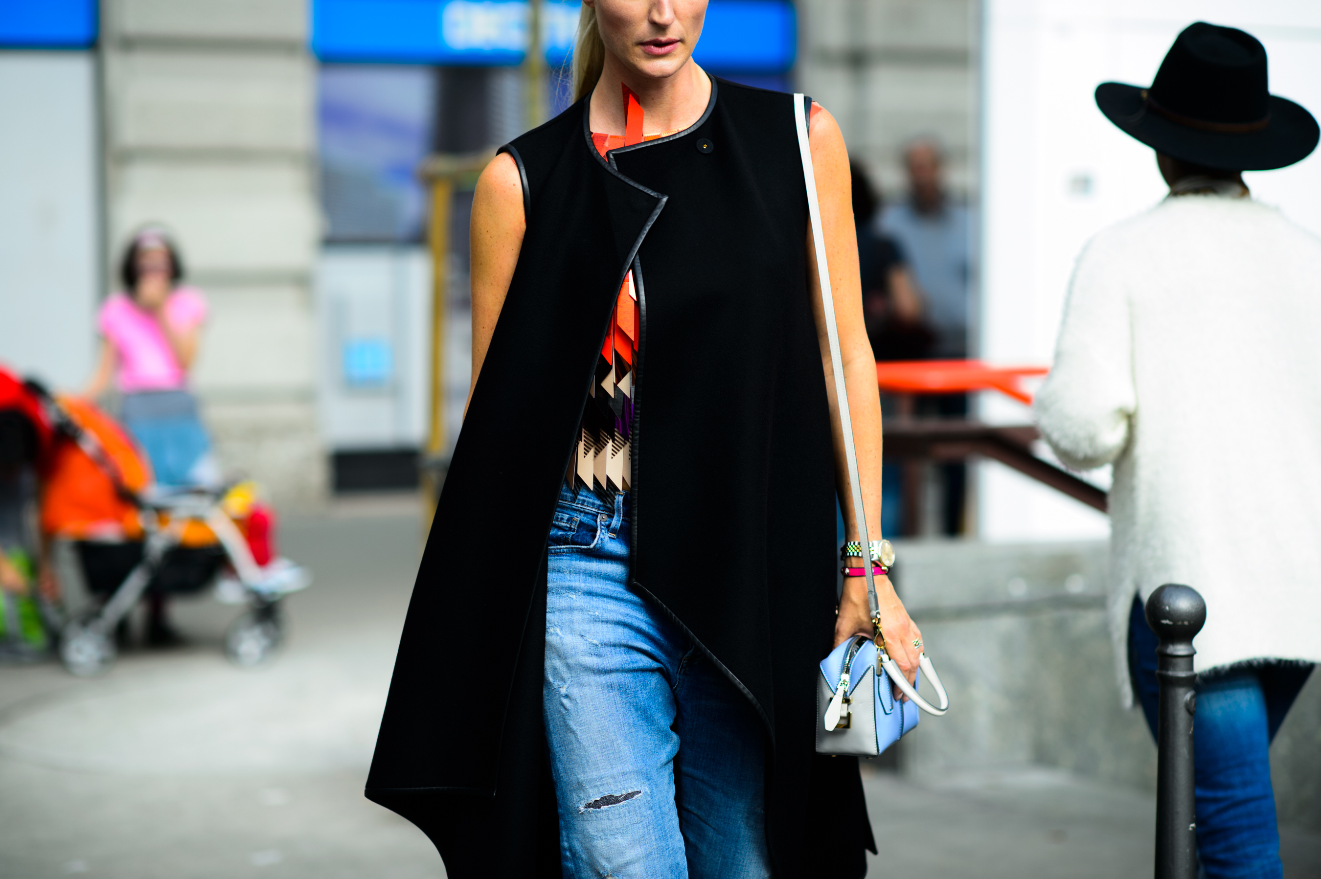 Woman with sequined sleeveless top