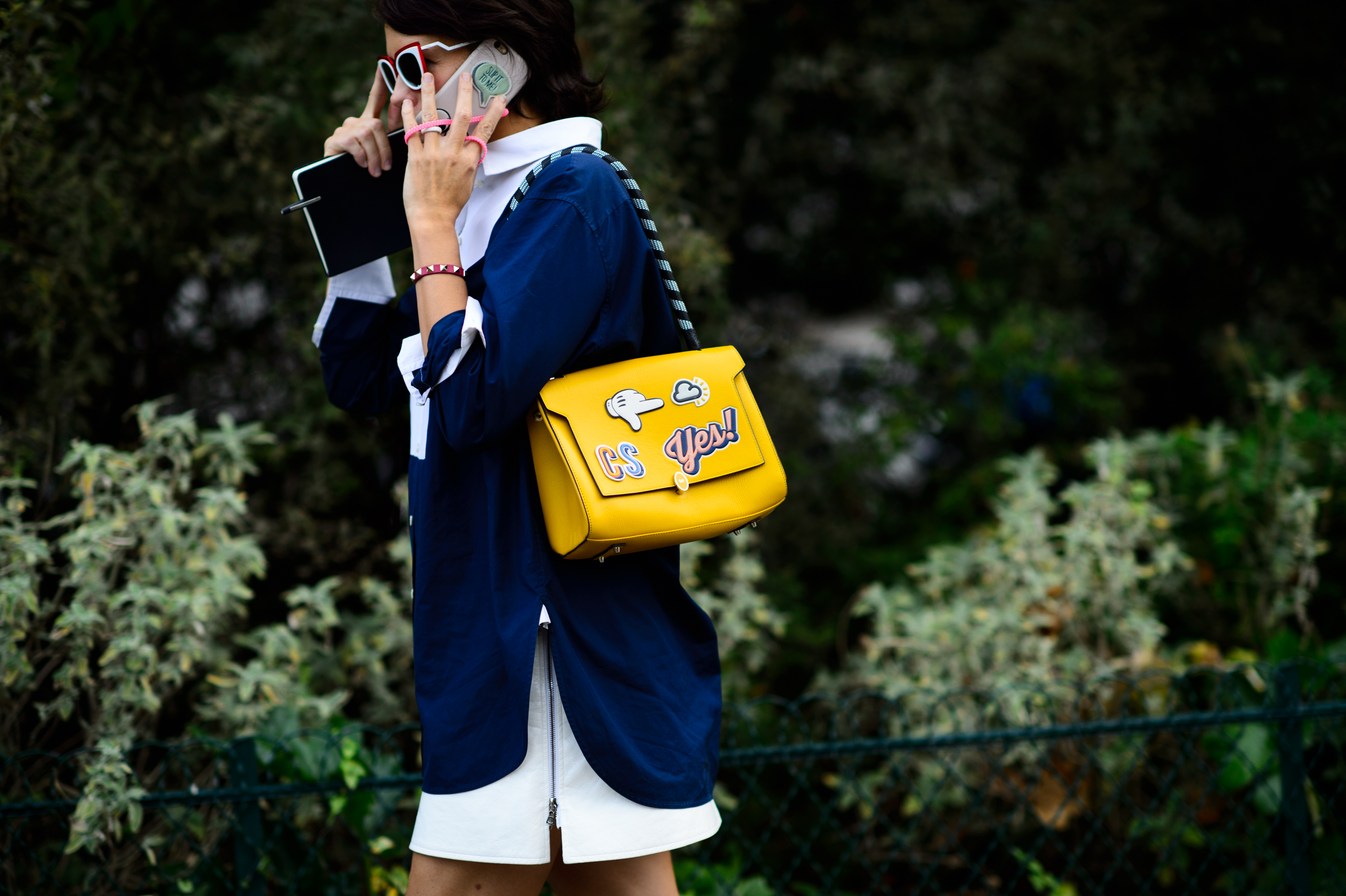 British woman wearing a yellow bag