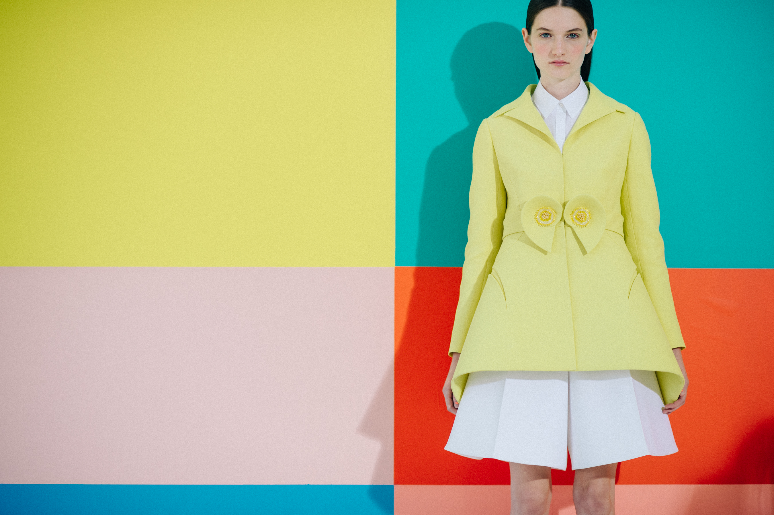Model Carly Moore in a yellow coat