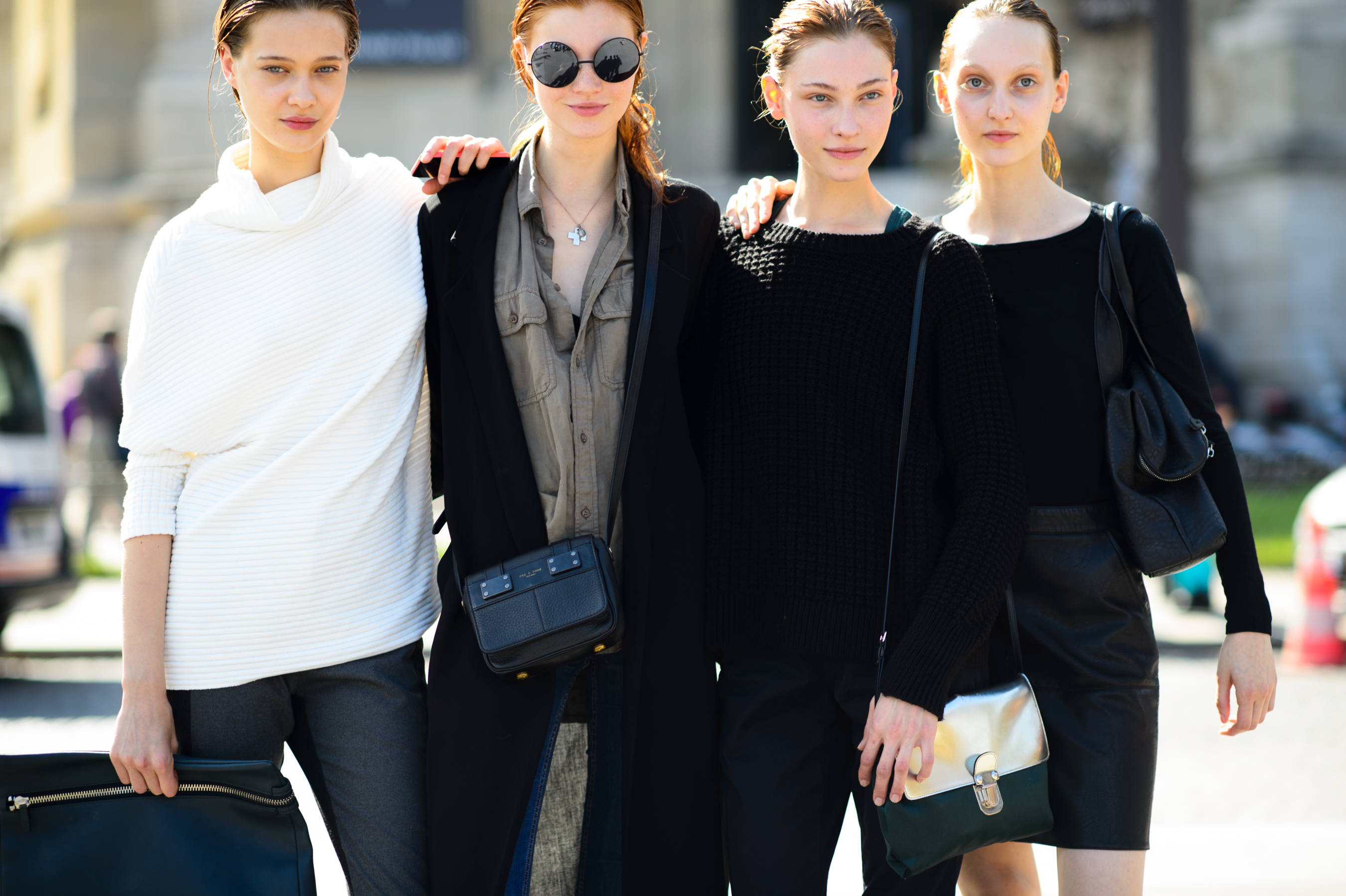 Four models after a fashion show