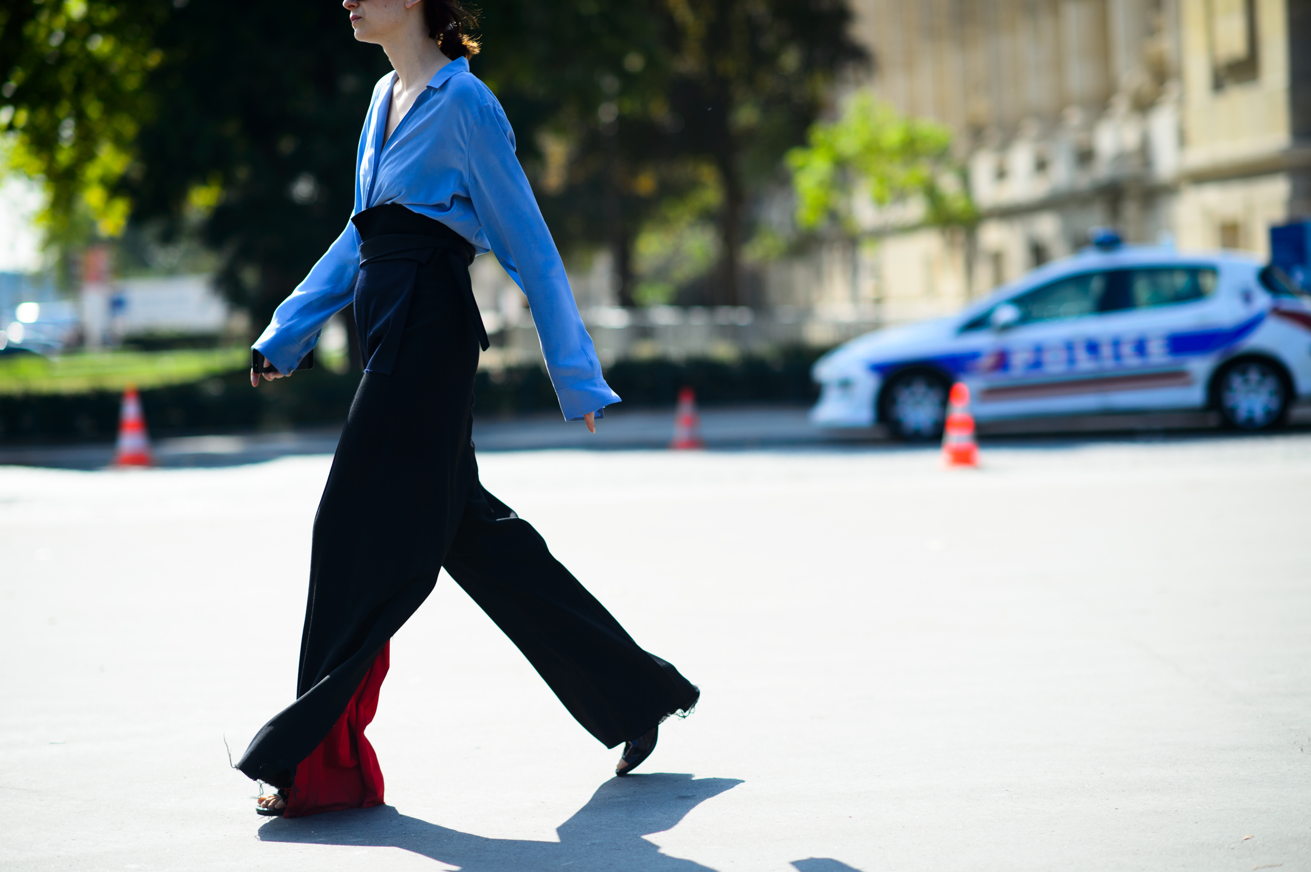 Woman wearing amazing pants with red detail
